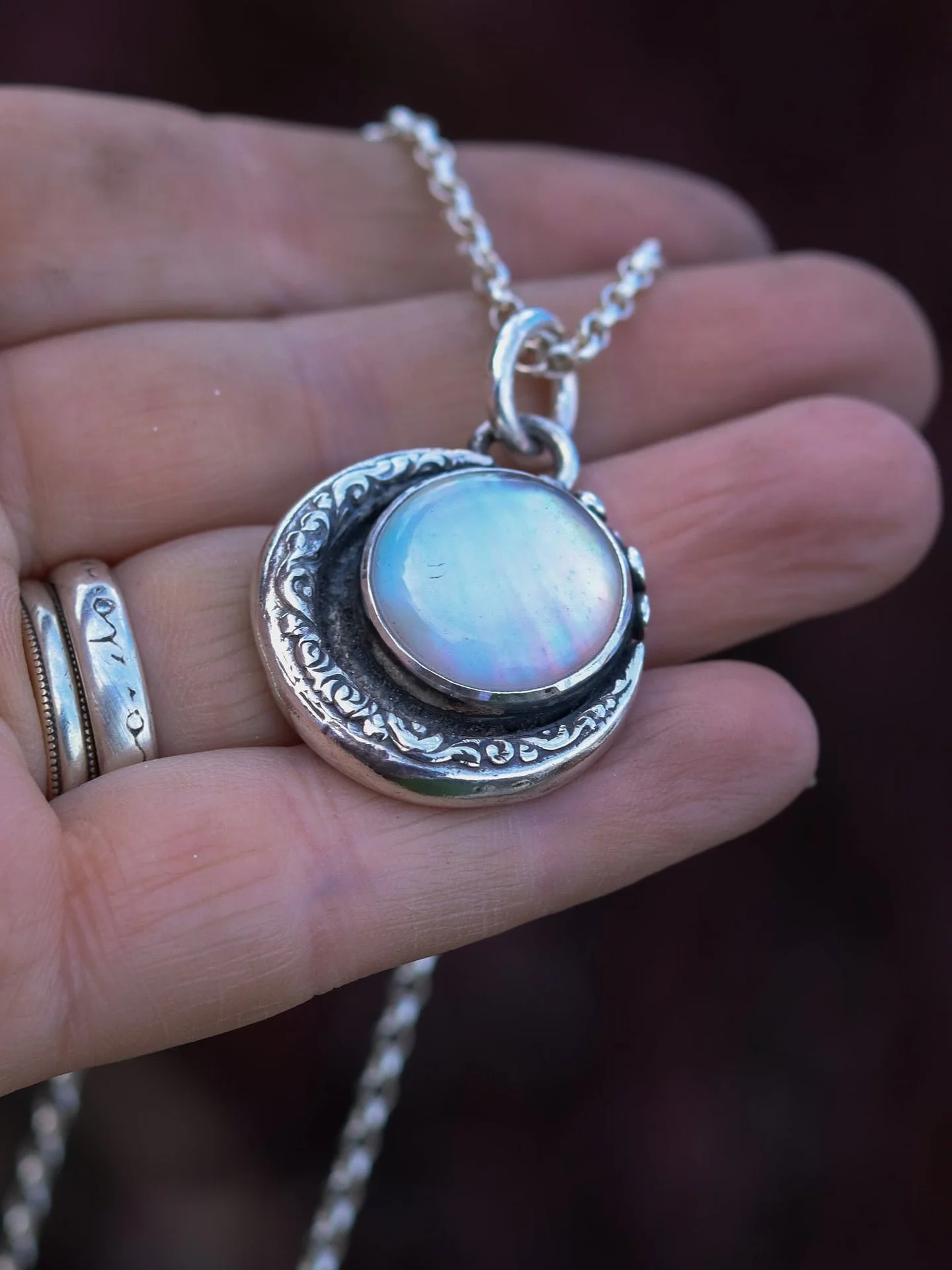 A Whisper of Moonlight 

A whisper of moonlight, woven in silver and spellcraft with Mother of Pearl catching the secrets of the night sky. 🌙✨ 

#WitchyJewels #MoonMagic #HandcraftedSilver #MotherOfPearl #MysticAdornment #gemheavenjewellery #sterlin