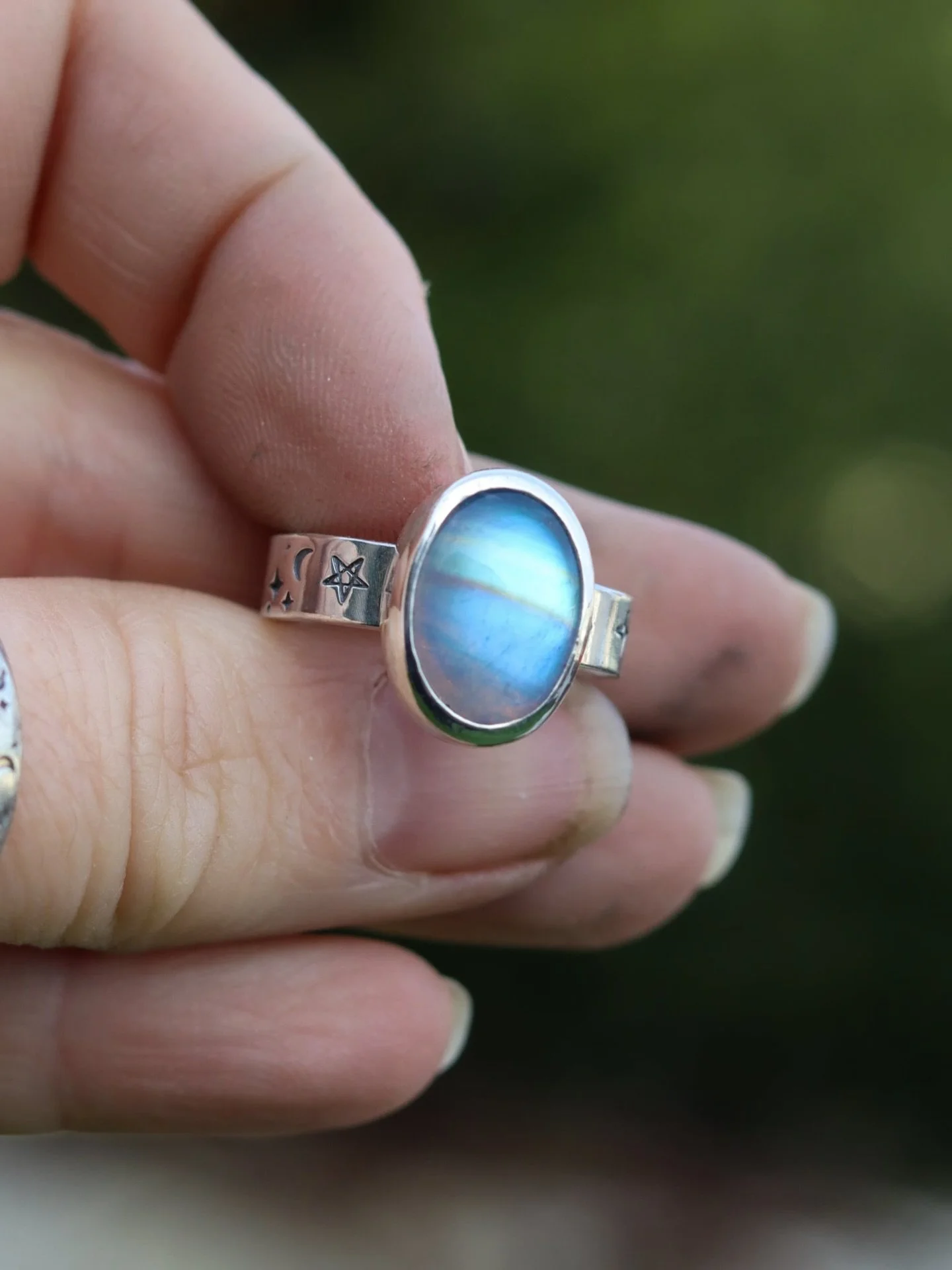 The Magic within Ring 

That reminder you are Magic!  Four beautiful stones to choose from on a ring band stamped with the moon and stars (and a little pentagram for extra magic for my Witches) 

This Moonstone just shone in all her glory amongst the
