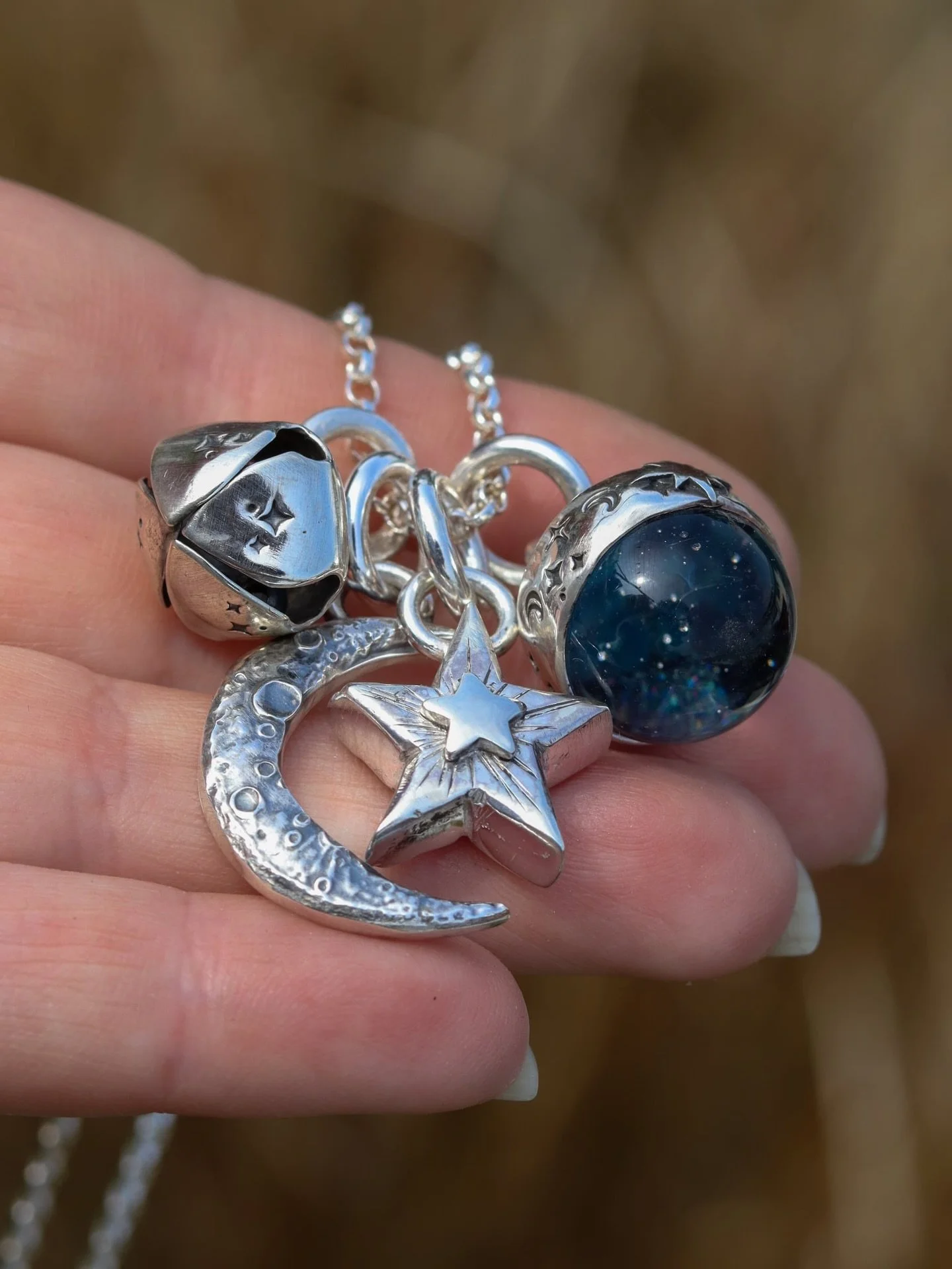 A recent commission of the most spectacular Storyteller Collection set! A Galaxy ball, Crescent moon, witches Bell and a hand carved in wax star that I cast here in my studio (love how it turned out!) there was a 5th charm with special meaning that I