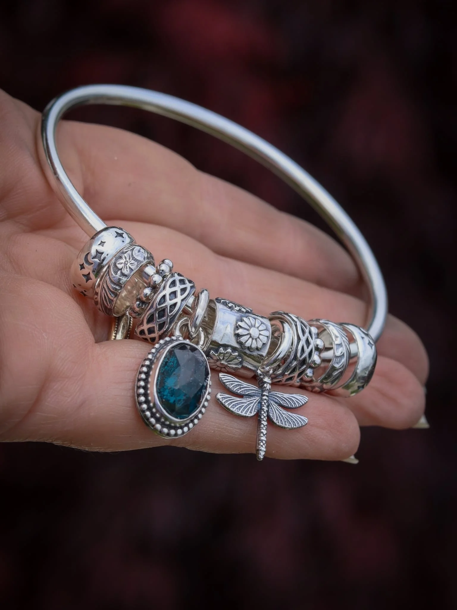The Storyteller Bangle

Although it seemed like eons ago since I was commissioned a Storyteller Charm bangle this one really made be delve deep within - the wonderful client gave me some little snippets of her life and I hope I captured it for her 💜