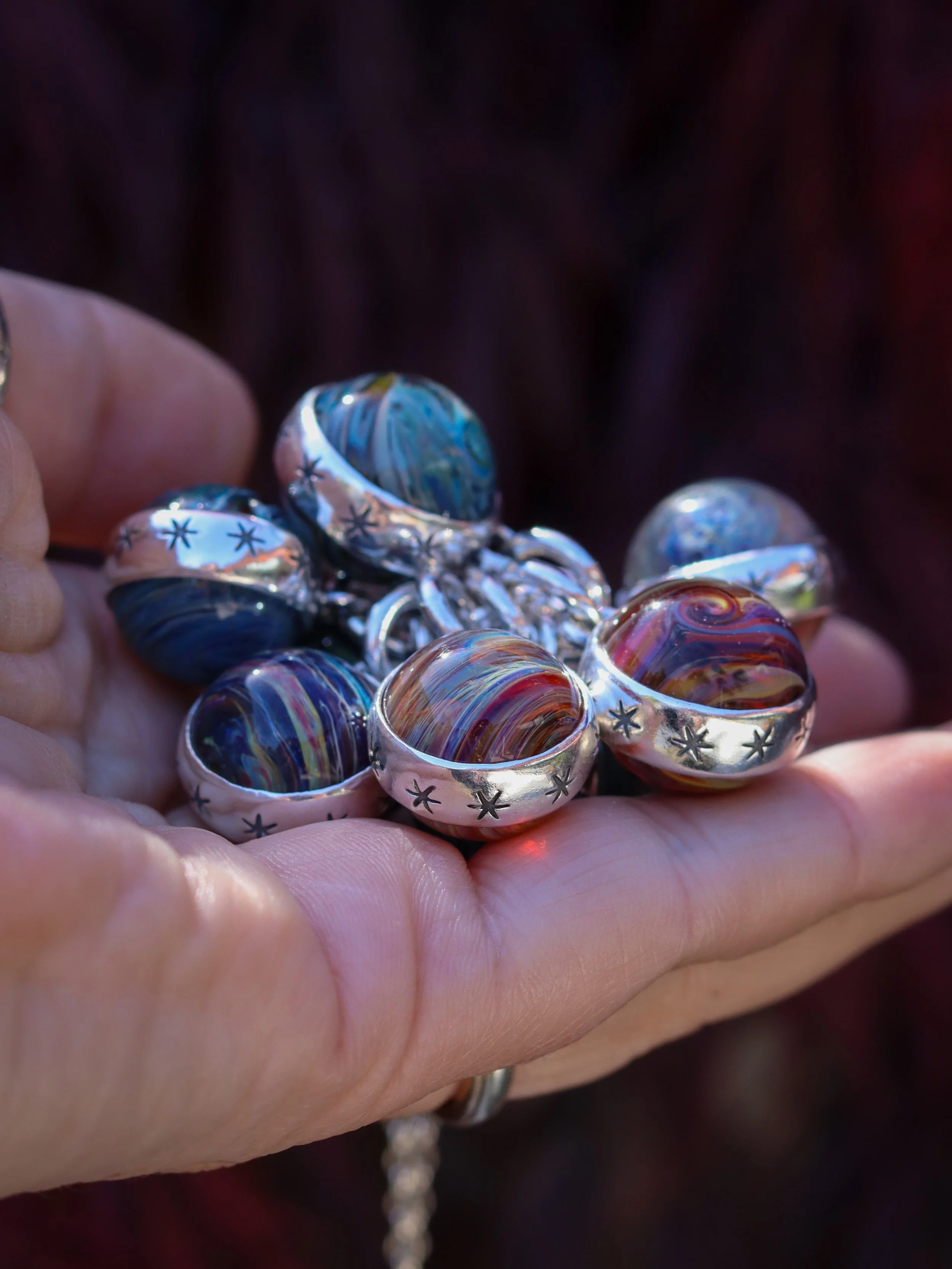 The Planetary Spinner charm