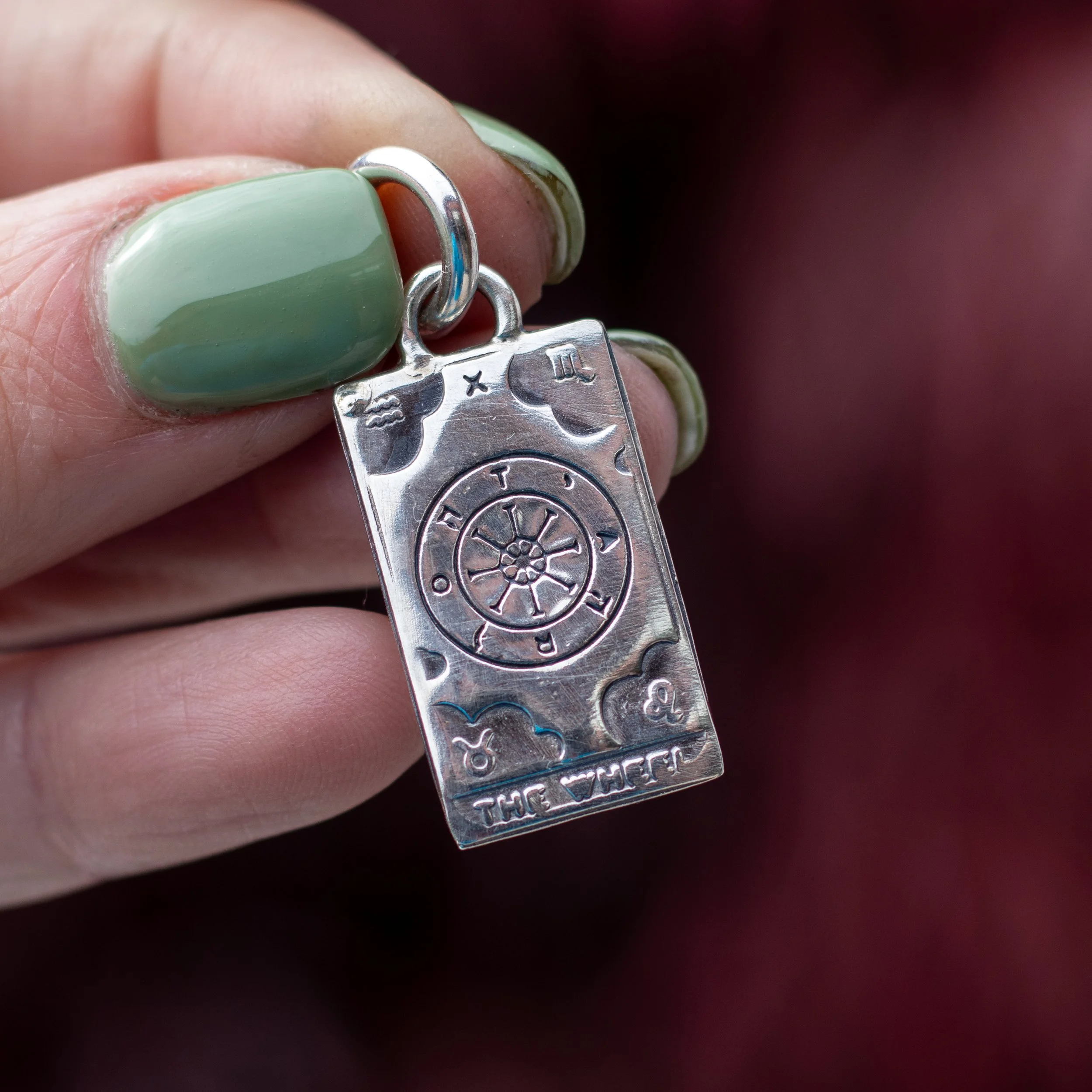 Silver pressed Wheel of the Year pendant by Gemheaven Jewellery