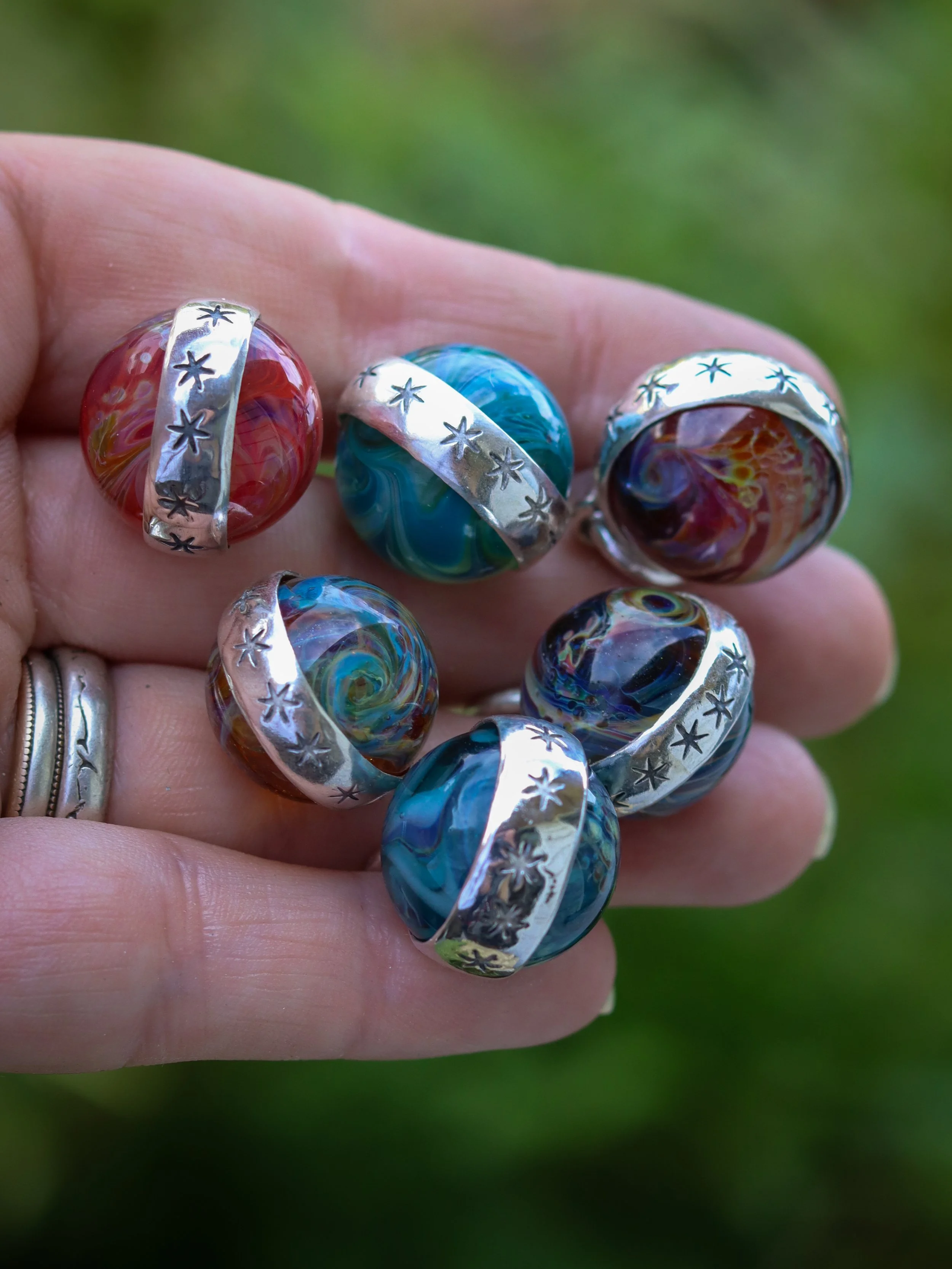 The Planetary Spinner charm