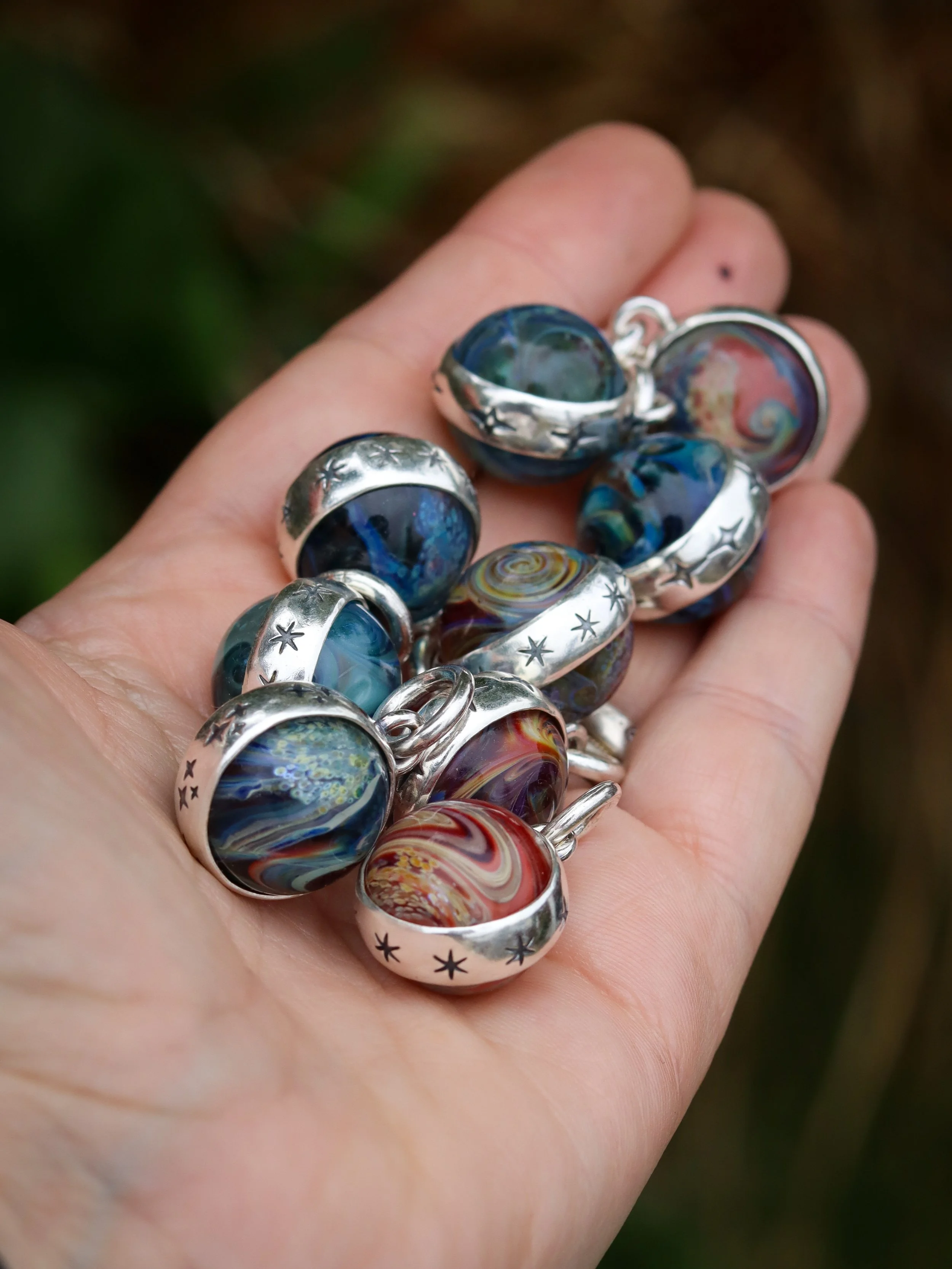 The Planetary Spinner charm