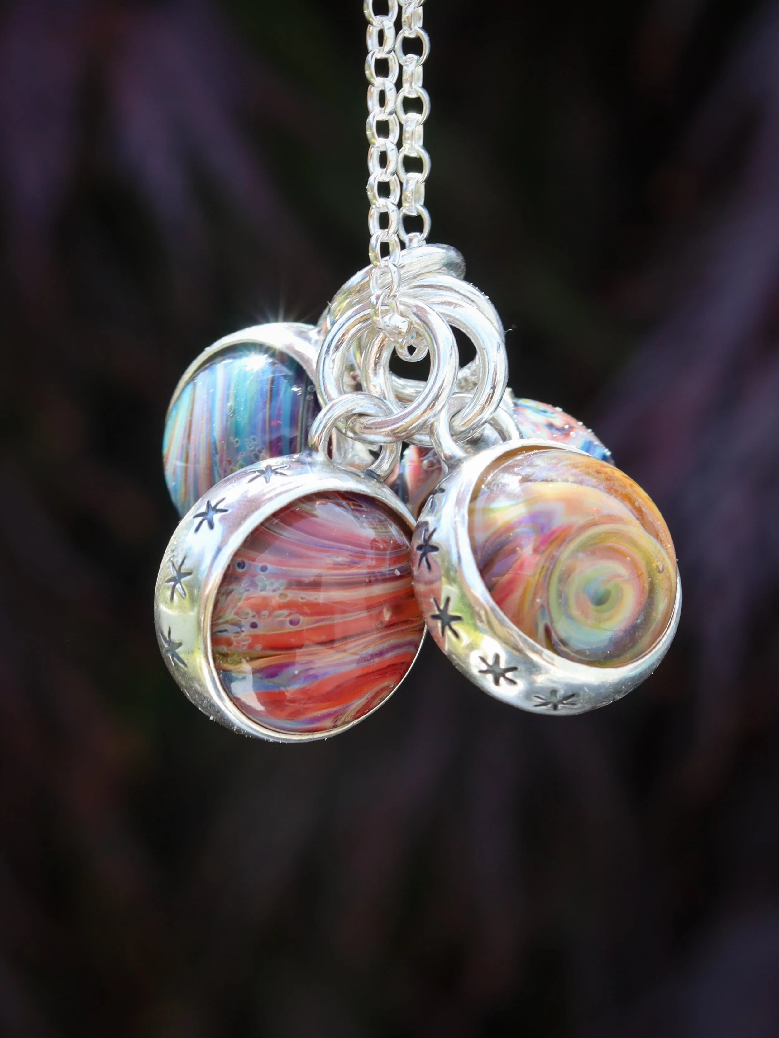 The Planetary Spinner charm