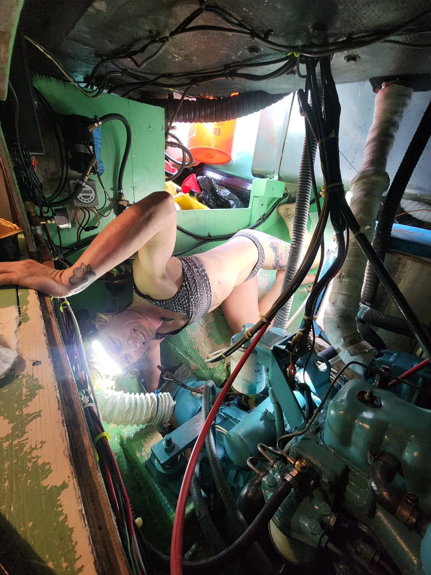 Could you fit in here? 

Searching for a diesel mechanically minded one to help us with an exhaust manifold gasket change (we hope!) Who can coach us thru this while laine and I crawl into the tiny spots. ;)