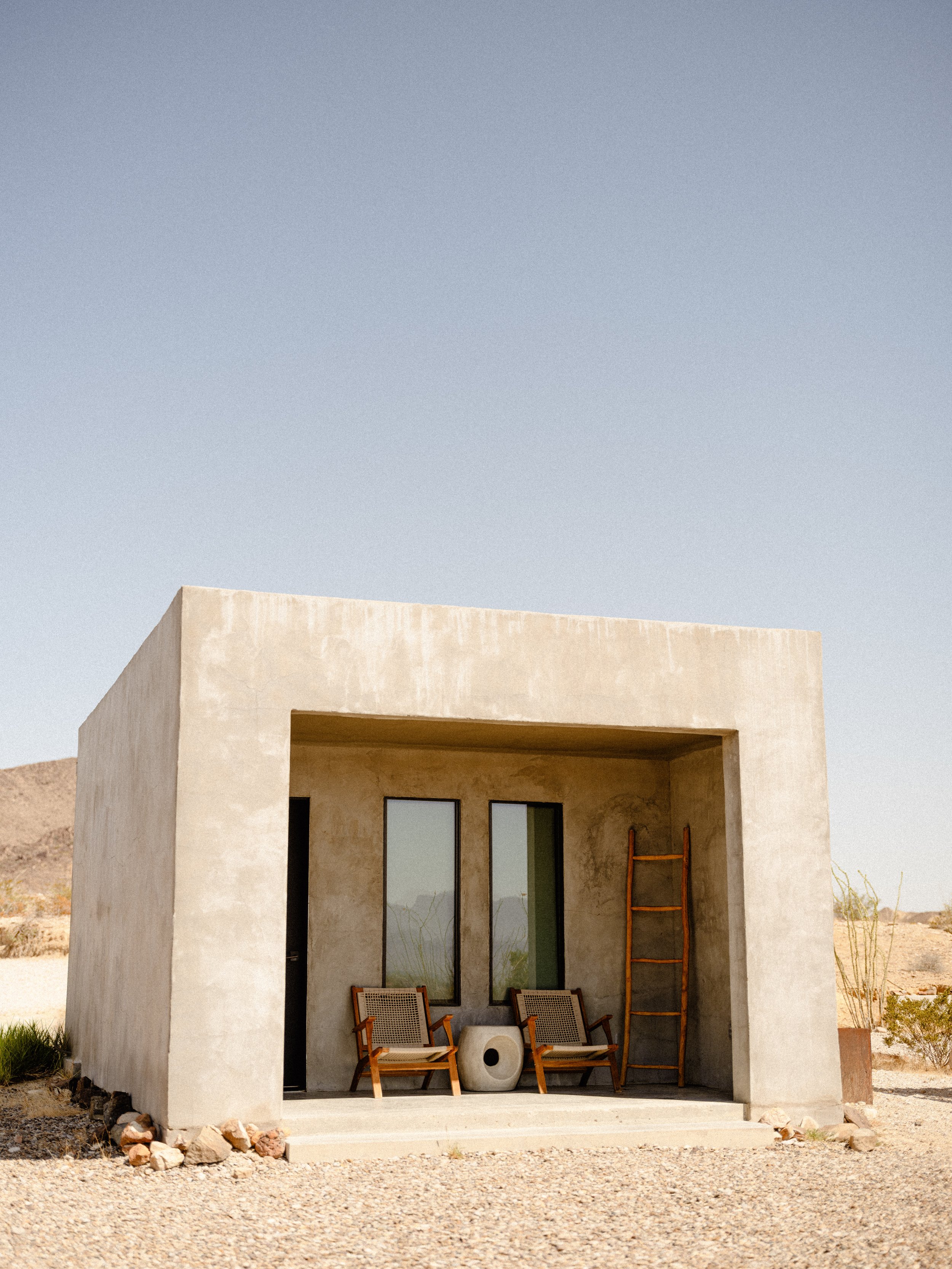 Willow House desert retreat — concrete cabin with recessed entryway, Terlingua, Texas — hospitality photography by Fora Publication
