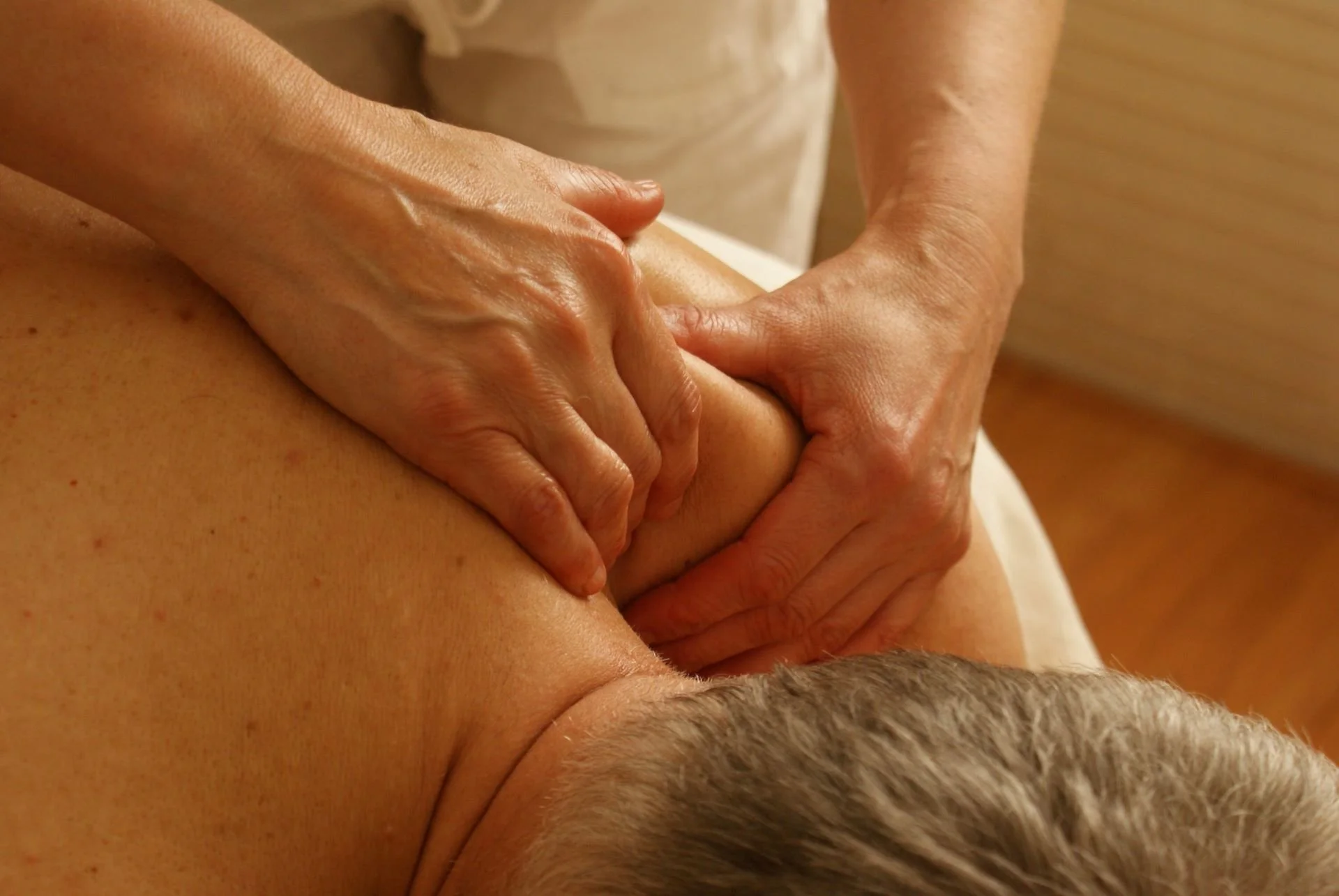 Neuromuscular Massage vs Deep Tissue Massage: Understanding the Differences Neuromuscular Massage vs Deep Tissue Massage: Understanding the Differences - A+man+is+getting+deep+tissue+massage