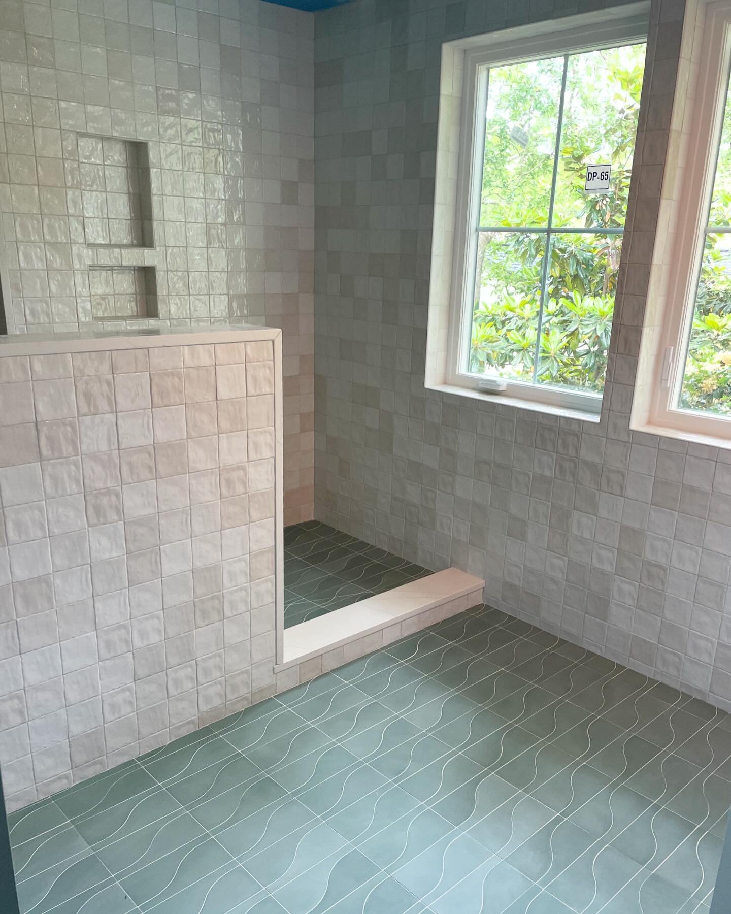 Tile almost complete ✔️ What a retreat this bathroom will be! We love this stunning cement floor tile from @zia_tile, which pairs perfectly with this soft wall tile from @tilebar 
.
.
.
.
.
.
.
.
.
.
.
.
.
#HamiltonBuildersSC #HamiltonBuildersCHS 
#C