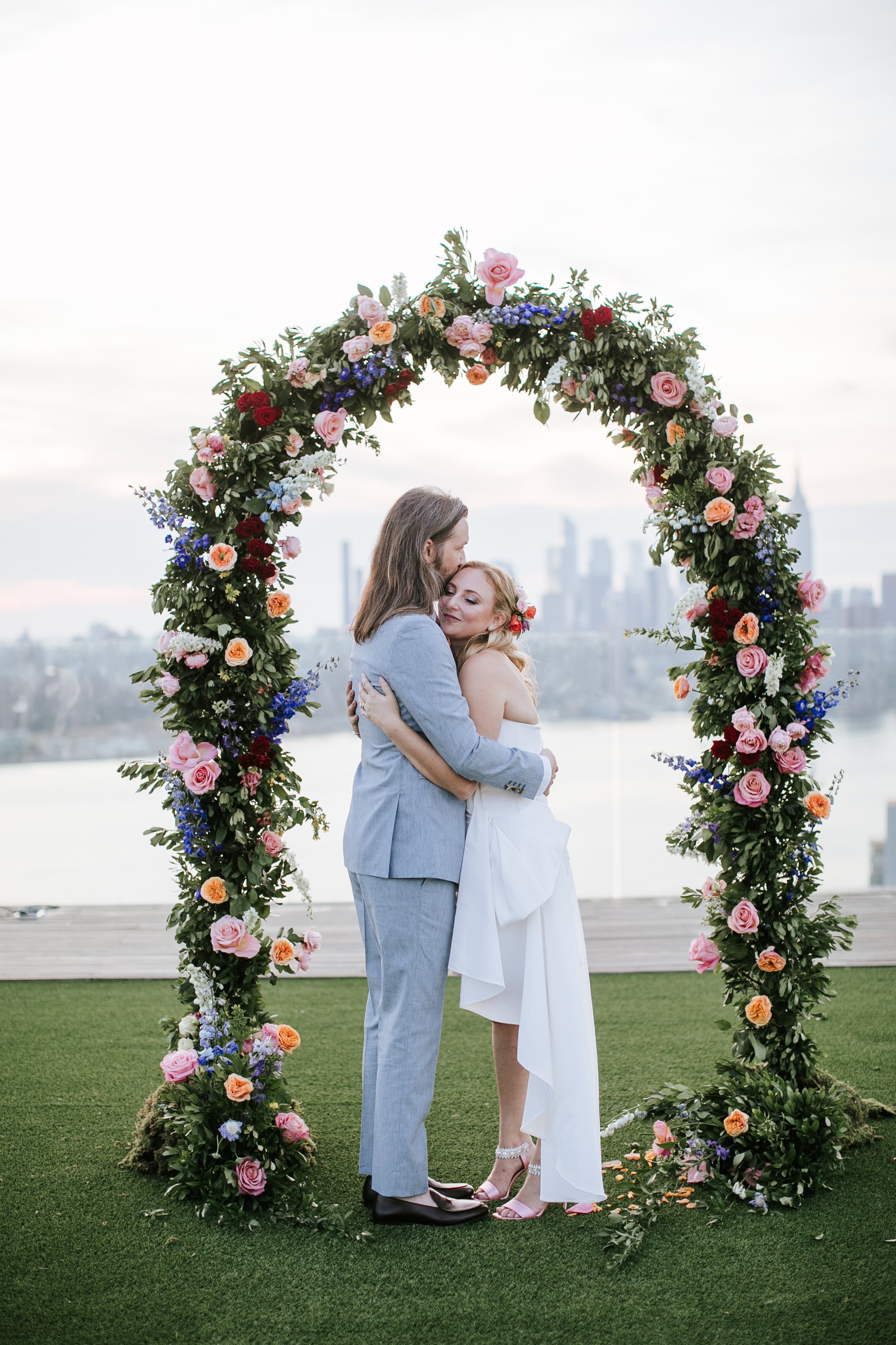Couple Hugging in front of NYC skyline.jpg