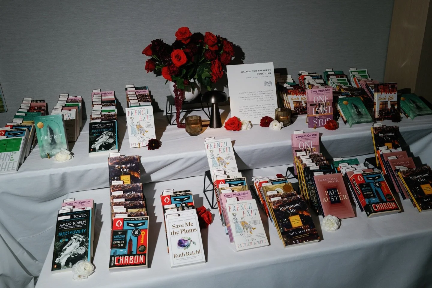 Escort cards, reimagined 📚

For Malika &amp; Spencer, finding your seat meant finding your book&hellip;it wasn&rsquo;t just a display, it became a conversation starter, a keepsake, and a small moment of pause before dinner 

This is one of my favori