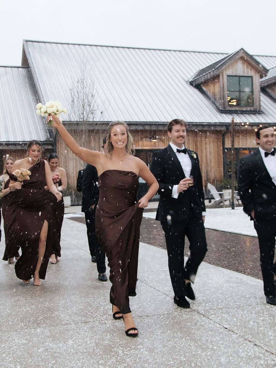Snow in Charleston during wedding party photos ❄️

Raven &amp; Alex and their favorite people fully leaned in and somehow it made the day even more magical 🤎🤍

@jenniferaustinphoto 
@bearded.florist 
@charlestonido 
@dunlinauberge 

&bull; &bull; &