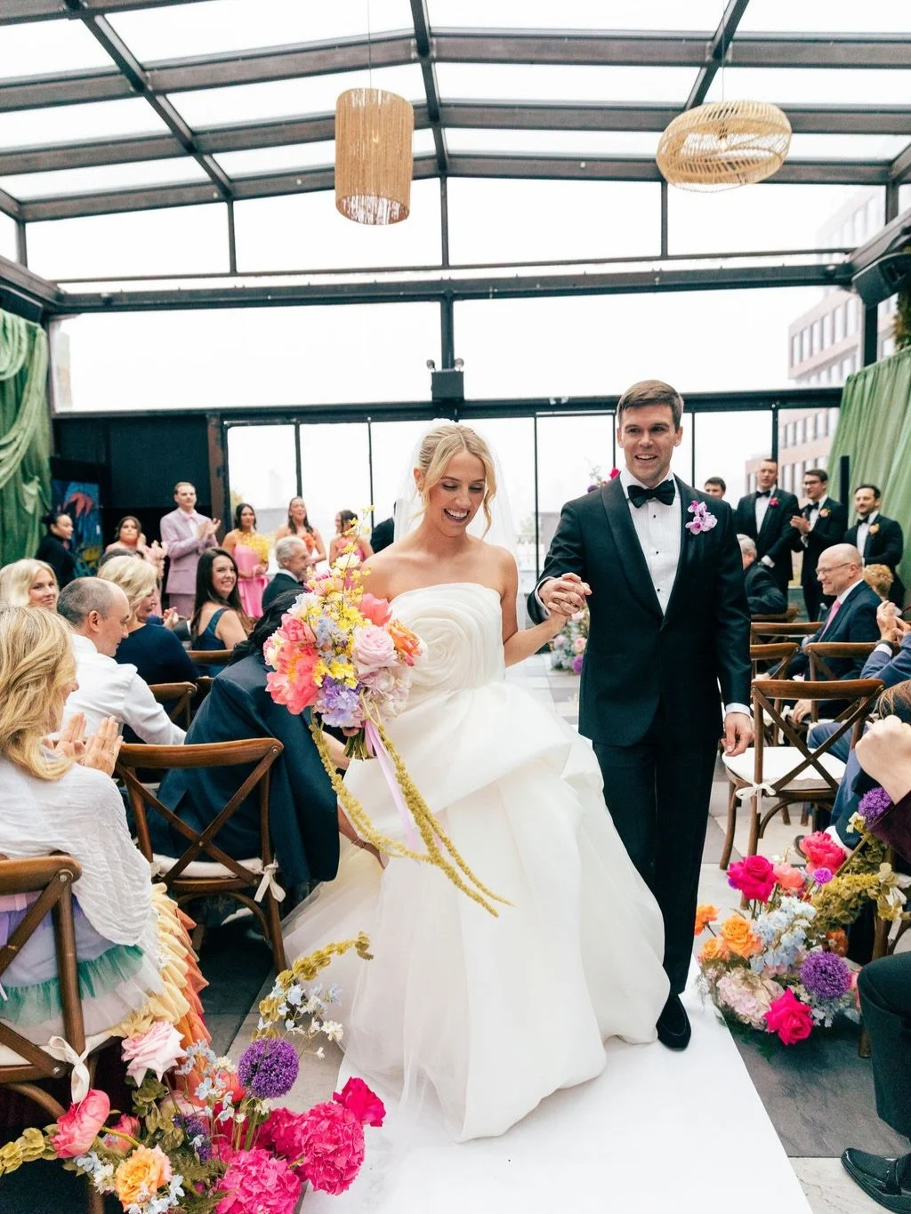 Some weddings just feel like the couple in every possible way, and this was one of them! Emily &amp; Alex wanted a wedding that felt joyful, colorful, delicious, a little unexpected, personalized, and fun! 

So naturally there were oyster towers, flo
