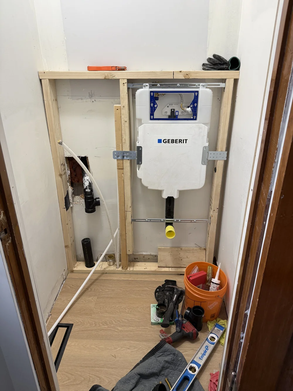 Roughing-in the toilet tank