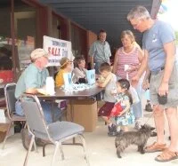 People Gathering at Outdoor Table