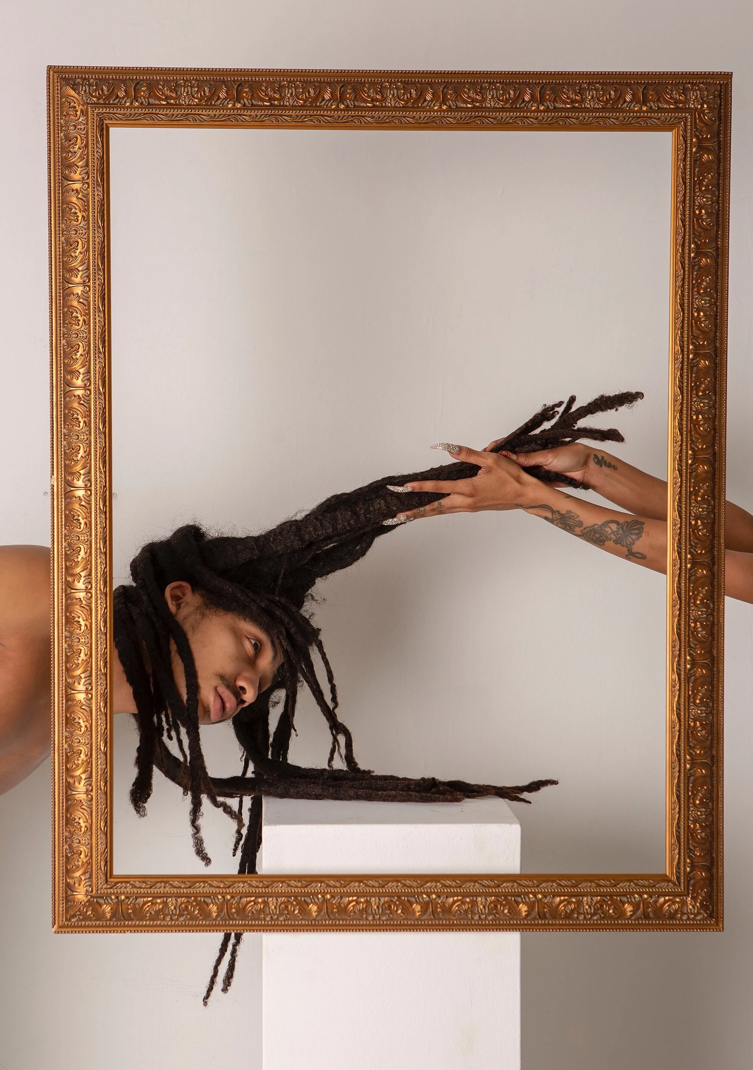 Self portrait, the artist framed.