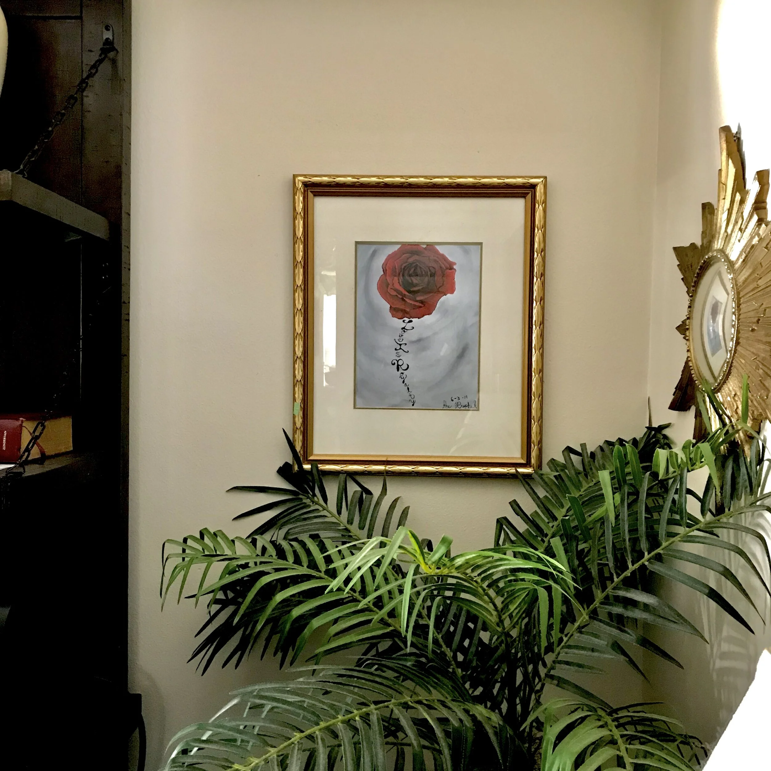 Love is royalty hung up on wall.jpg