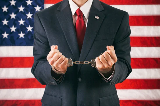 canva-man-with-hands-in-handcuffs-MABw4Pn9avA.jpg