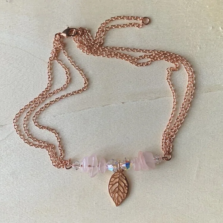 79. Swarovski crystals and rose quartz chip anklet | $20.00