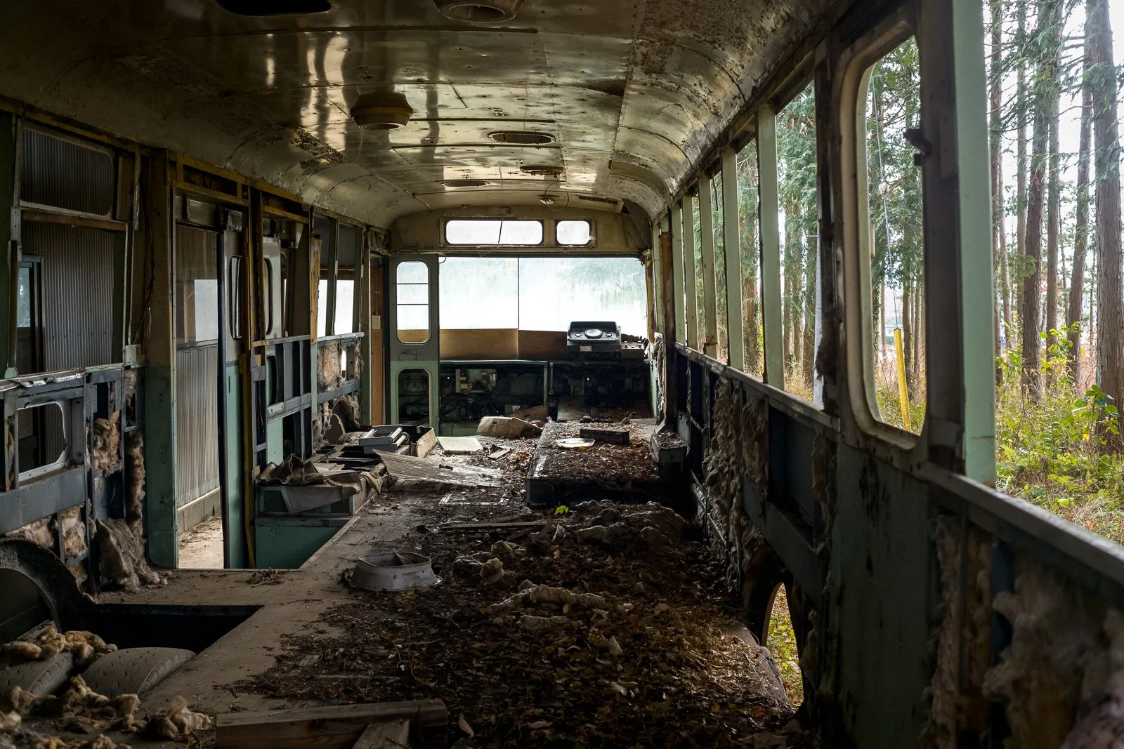 Abandoned roadside restaurant built around a bus in rural Japan