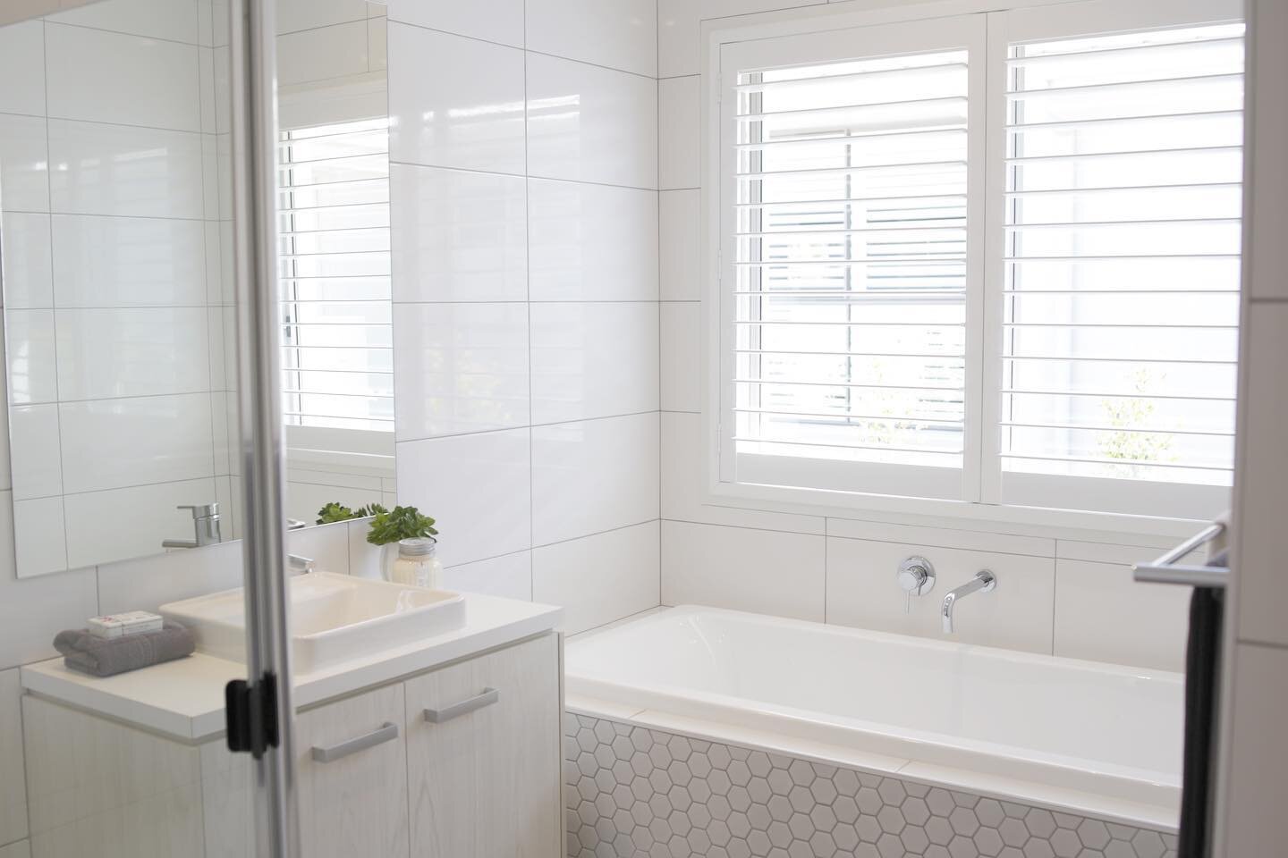 Impervious to moisture, easy to operate and looking an absolute treat! Our Inception Fauxwood Shutters are the perfect accent to elevate your bathroom renovation.

#bathroomrenovation #honeycombtile #tiledesign #bathroom #bathroomdesign #plantationsh