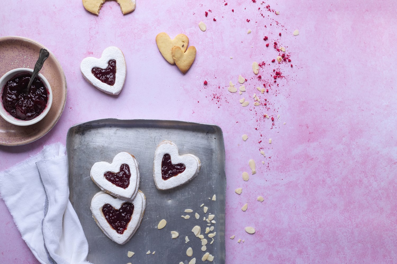 Raspberry Linzer biscuits are a great gift for your vegan valentine.