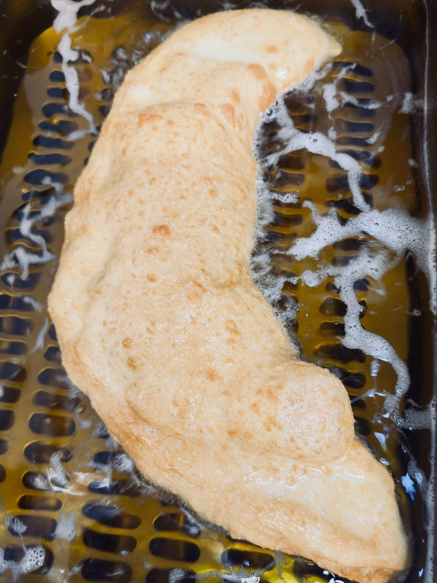 Fritta Fridays at Napz. 🍕🔥

Have you tried one of our Pizza Frittas yet? A true Neapolitan street food classic &mdash; soft dough, deep fried, and stuffed with:

🧀 Ricotta &amp; Fior di Latte Mozzarella
🍖 Prosciutto Cotto
🍅 Roma Tomato

Crispy o