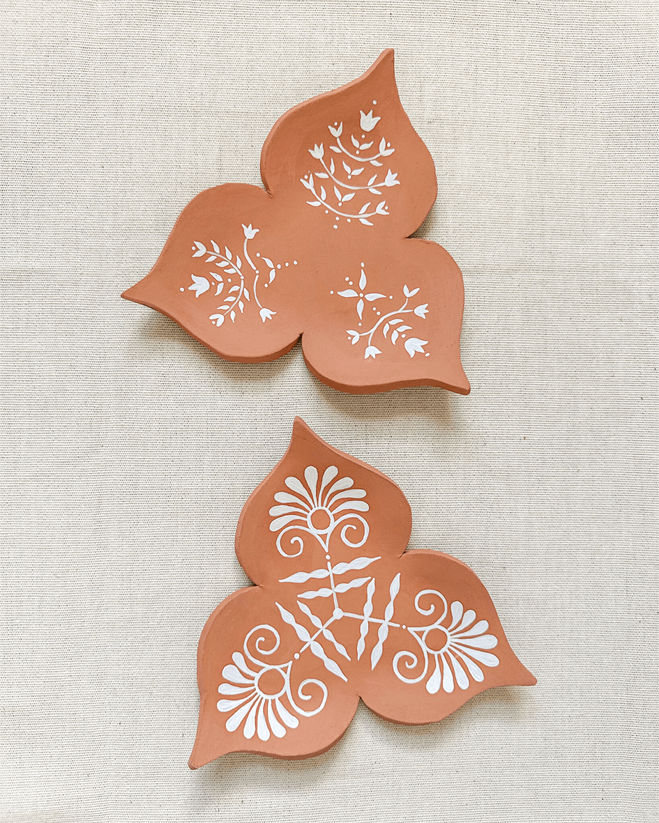 Mismatched Pair of Handmade Terracotta Ceramic Trinkets Hand Painted With White Underglaze Pattern.png