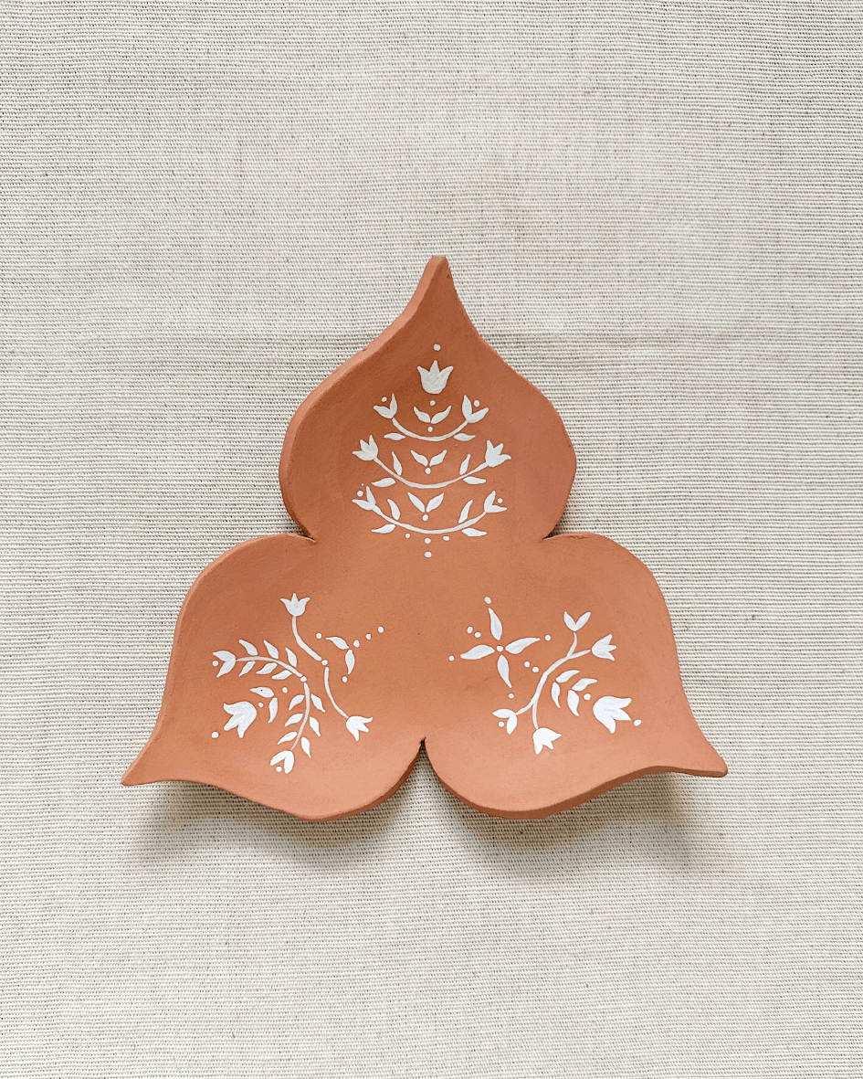Handmade Collection of Terracotta Clay Curios Hand Painted With White Underglaze Pattern.png