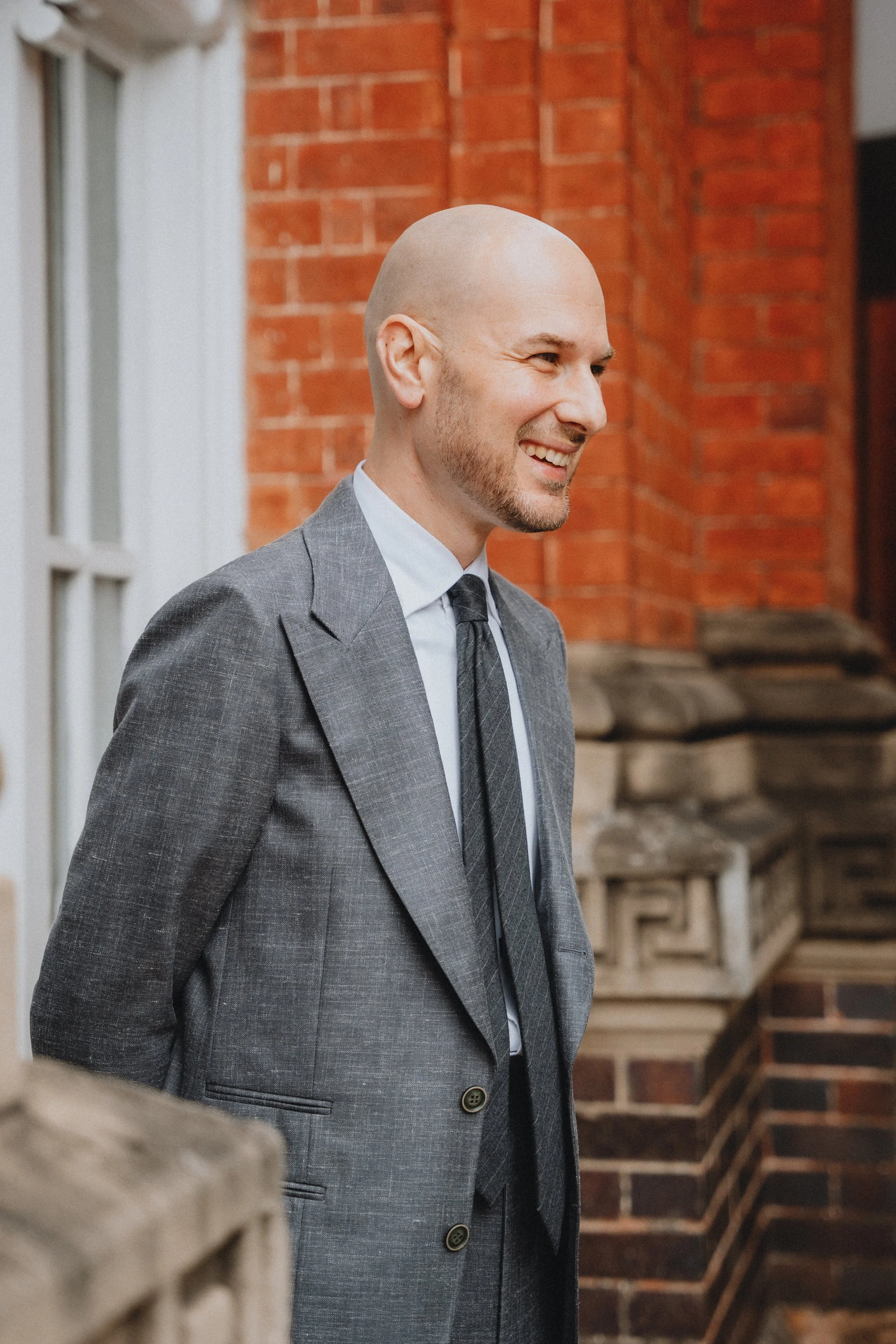 Aleksandar Stately in his grey made to measure peak lapel suit Brisbane Australia