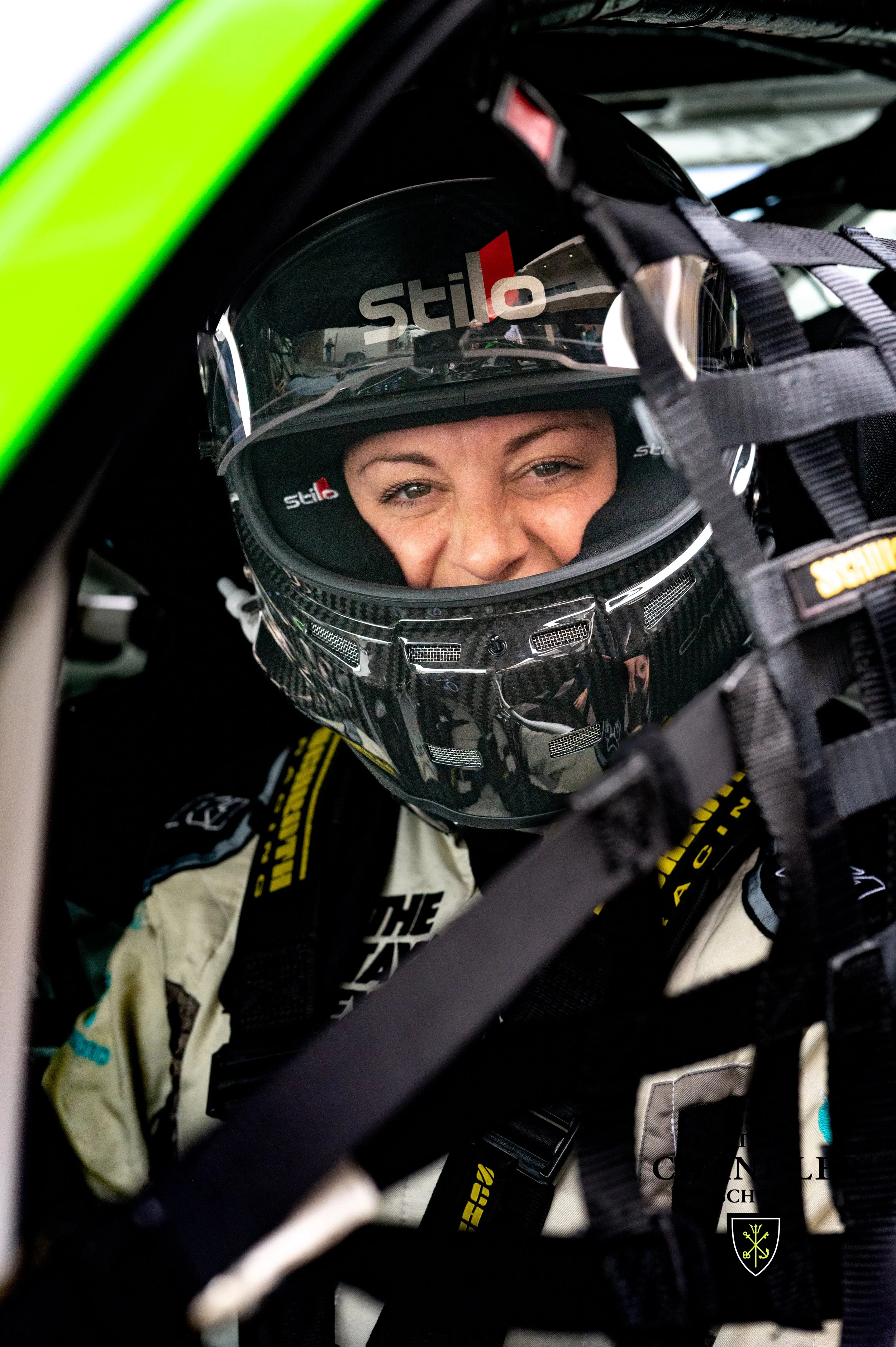 Tayne Griffin, race car driver and motivational speaker spent time with our girls at the race.