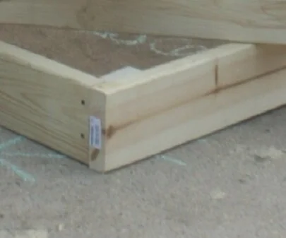 Corner of a 2x6 garden box (interior 2x4 to hold the corners as described above).  If you were building an 11-inch box you would just add another layer (and your corner bracket would have been taller).