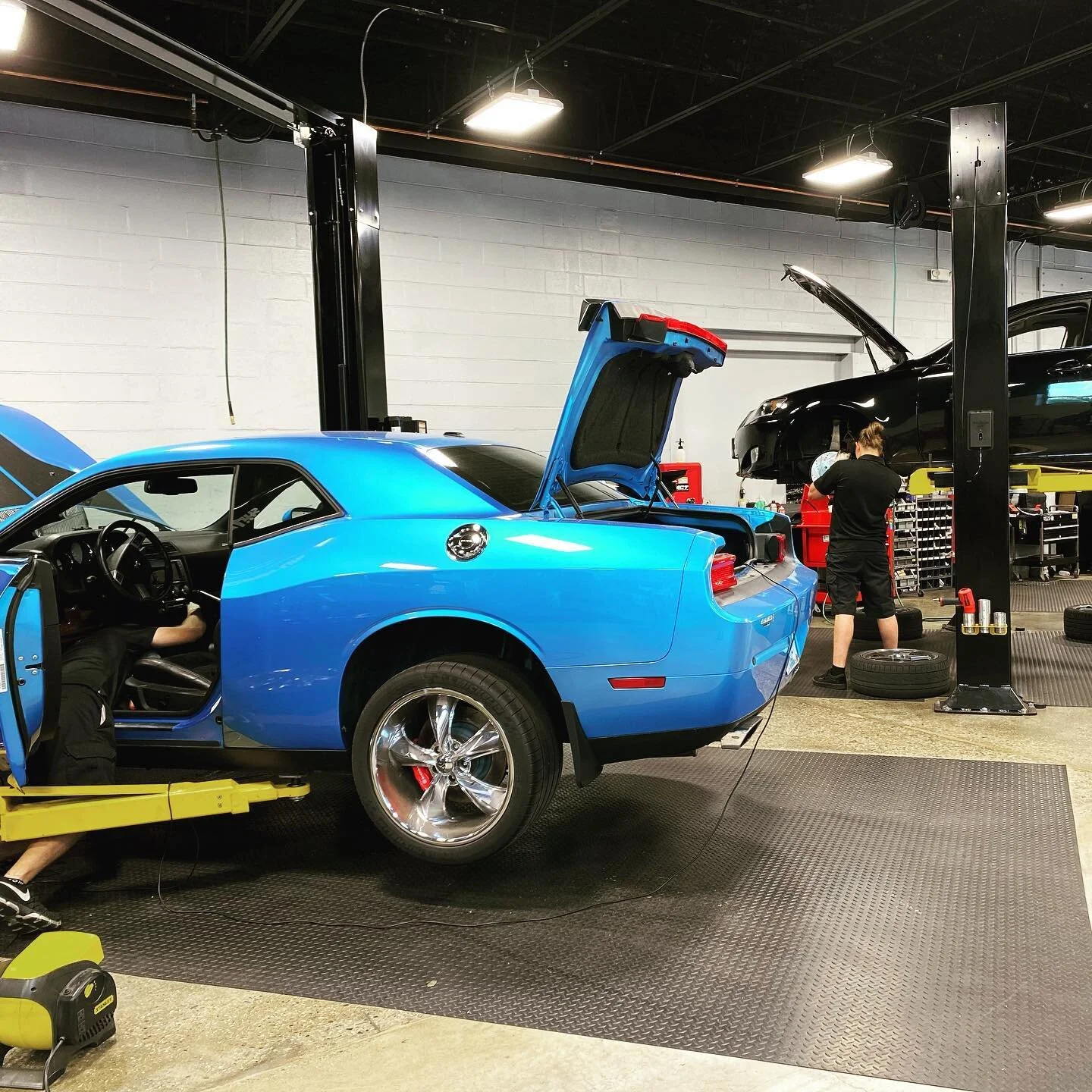 Happy Friday! It&rsquo;s been a hot summer thus far but the team is still pushing! Enjoy the weekend! #synergyautolab #newhampshire #challenger #evo #mercedesbenz #summerdays