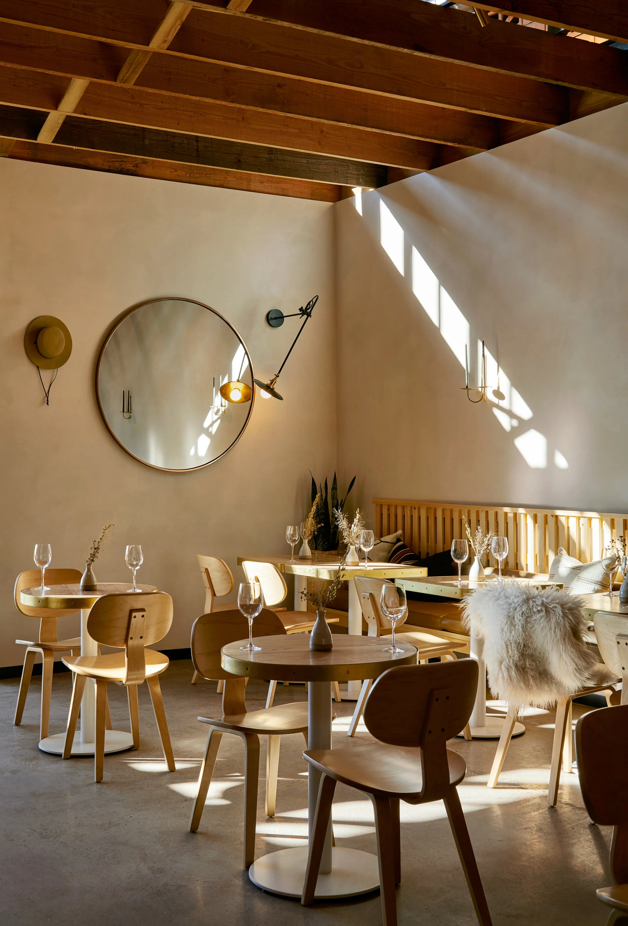 Shortlisted for bar interior of the year at Dezeen Awards 2020, a former lumberyard in Albuquerque has been reimagined into an artisanal food hall, cafe and wine bar.