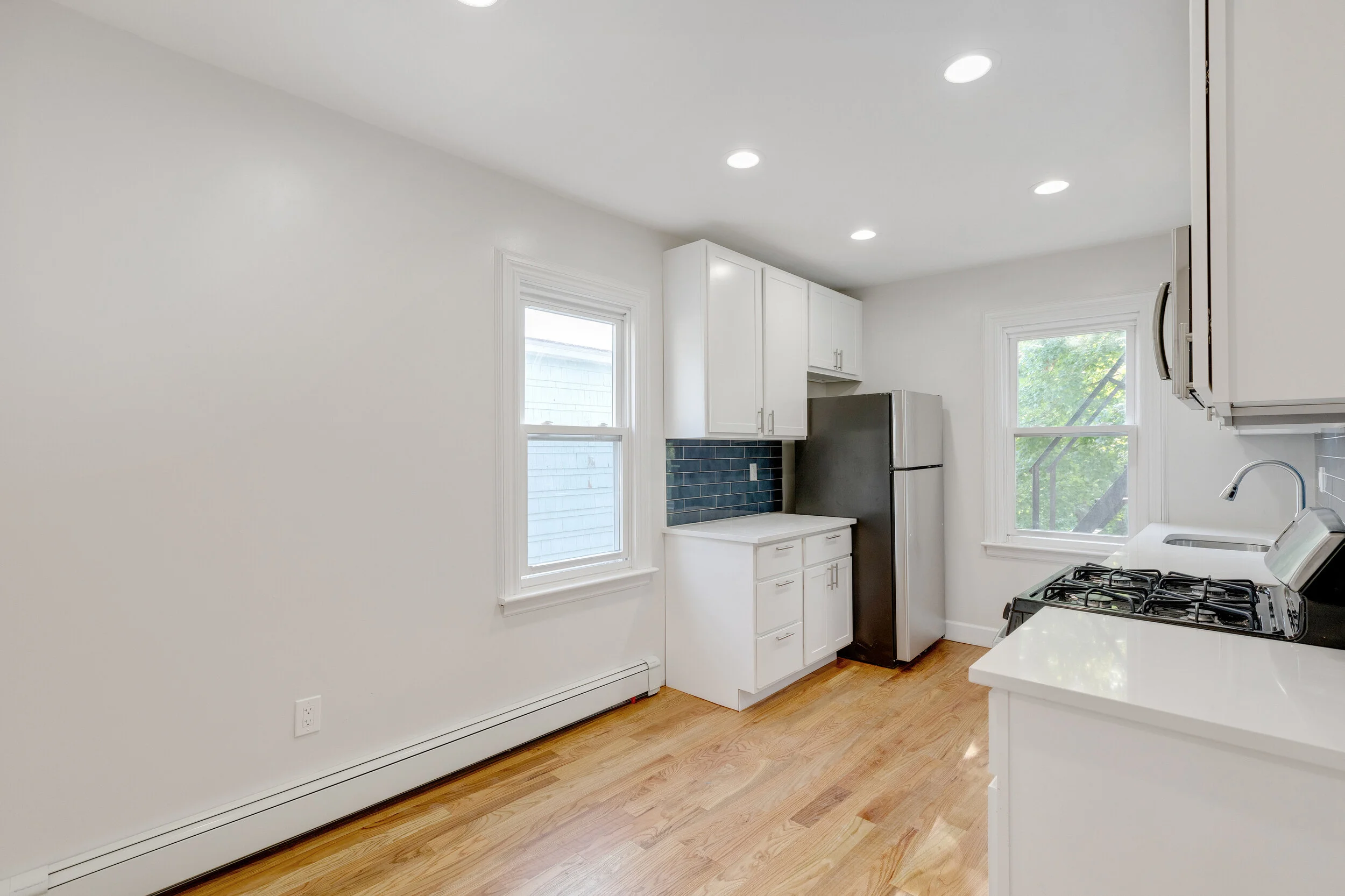 This bright, lovely, brand new 2 bedroom on the 2nd floor of fully renovated 3-unit home