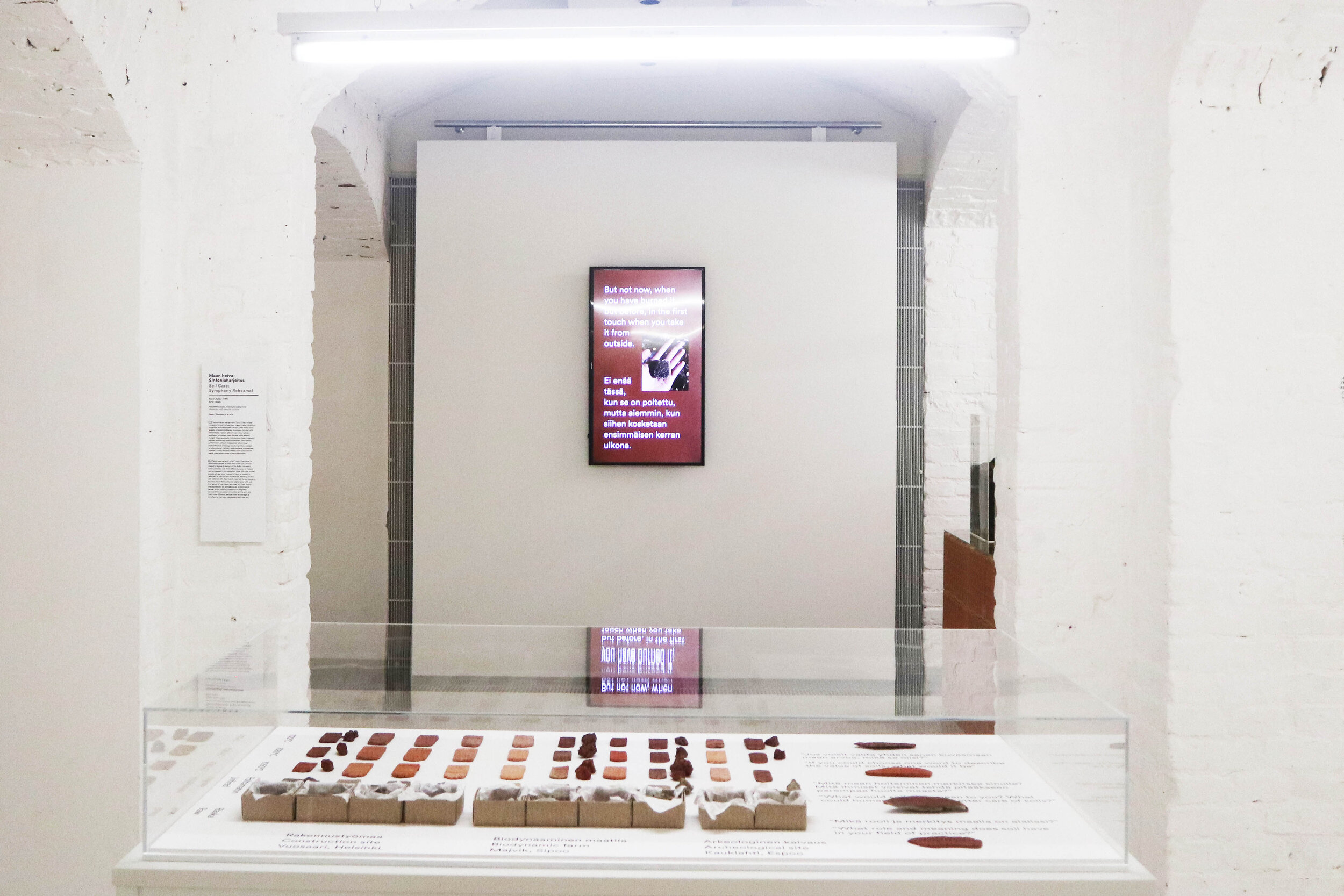   Tzuyu Chen’s Soil Care project consists of a three soil stories on a video screen alongside a material archive box, where it shows soil samples gathered from different localities in Finland. Photo: Tzuyu Chen  