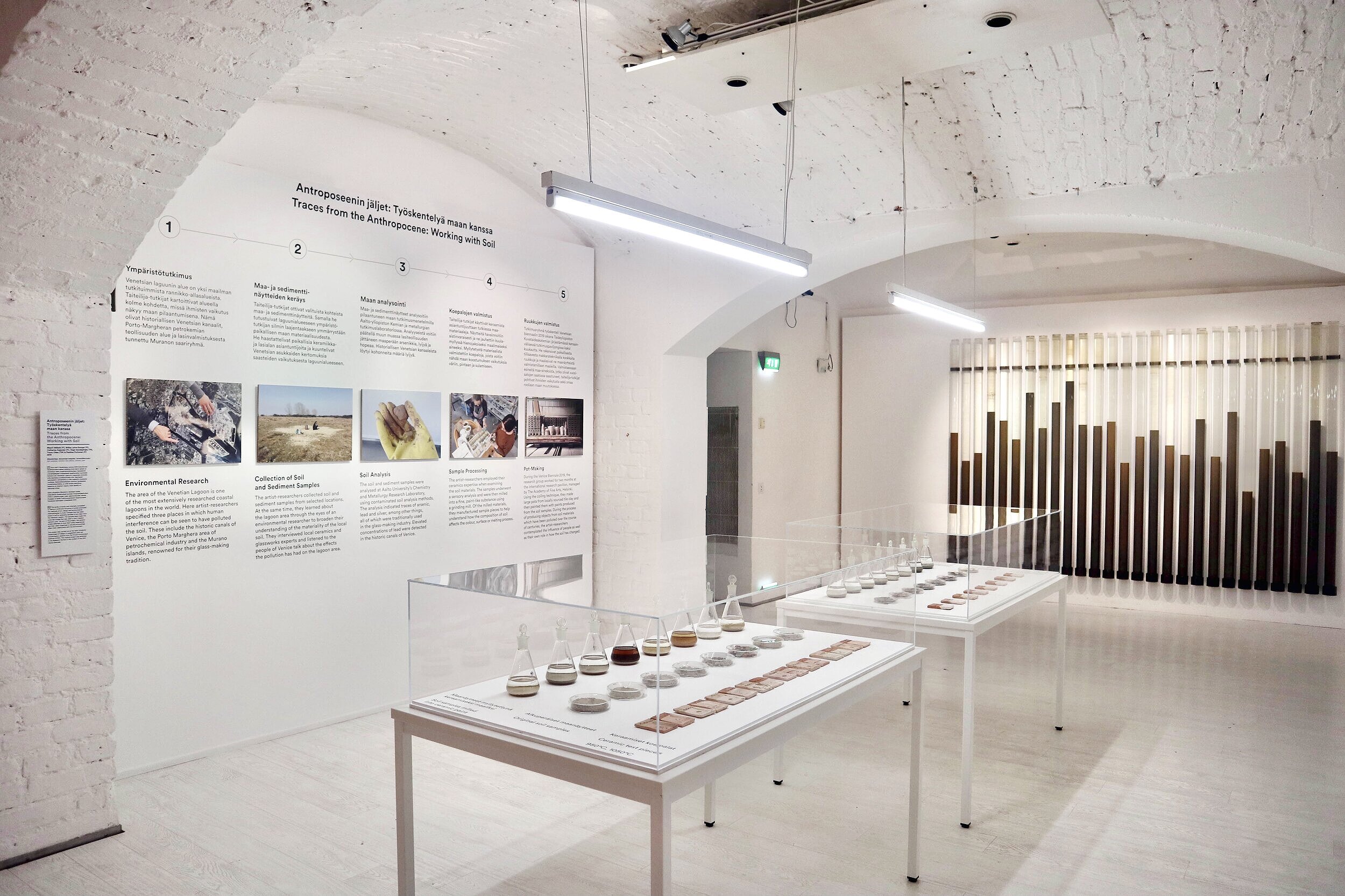   The research process of the Traces from the Anthropocene: Working with Soil project (on wall) shows how the contaminated soil and sediment from the Venice Lagoon area was collected, analysed and transformed to ceramic material. Photo: Tzuyu Chen  