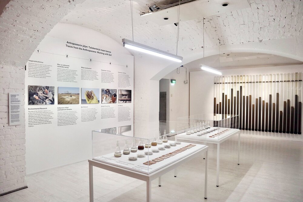   The research process of the Traces from the Anthropocene: Working with Soil project (on wall) shows how the contaminated soil and sediment from the Venice Lagoon area was collected, analysed and transformed to ceramic material. Photo: Tzuyu Chen  