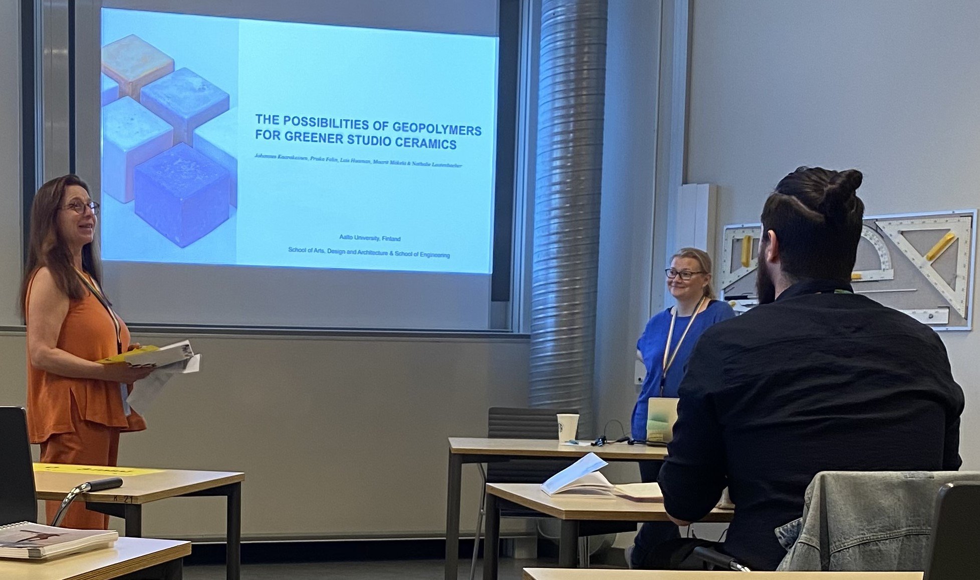 Professor Maarit Mäkelä chairing the session where postdoctoral researcher Priska Falin presented the investigation done with geopolymers_Photo_Sara Hulkkonen_.jpg