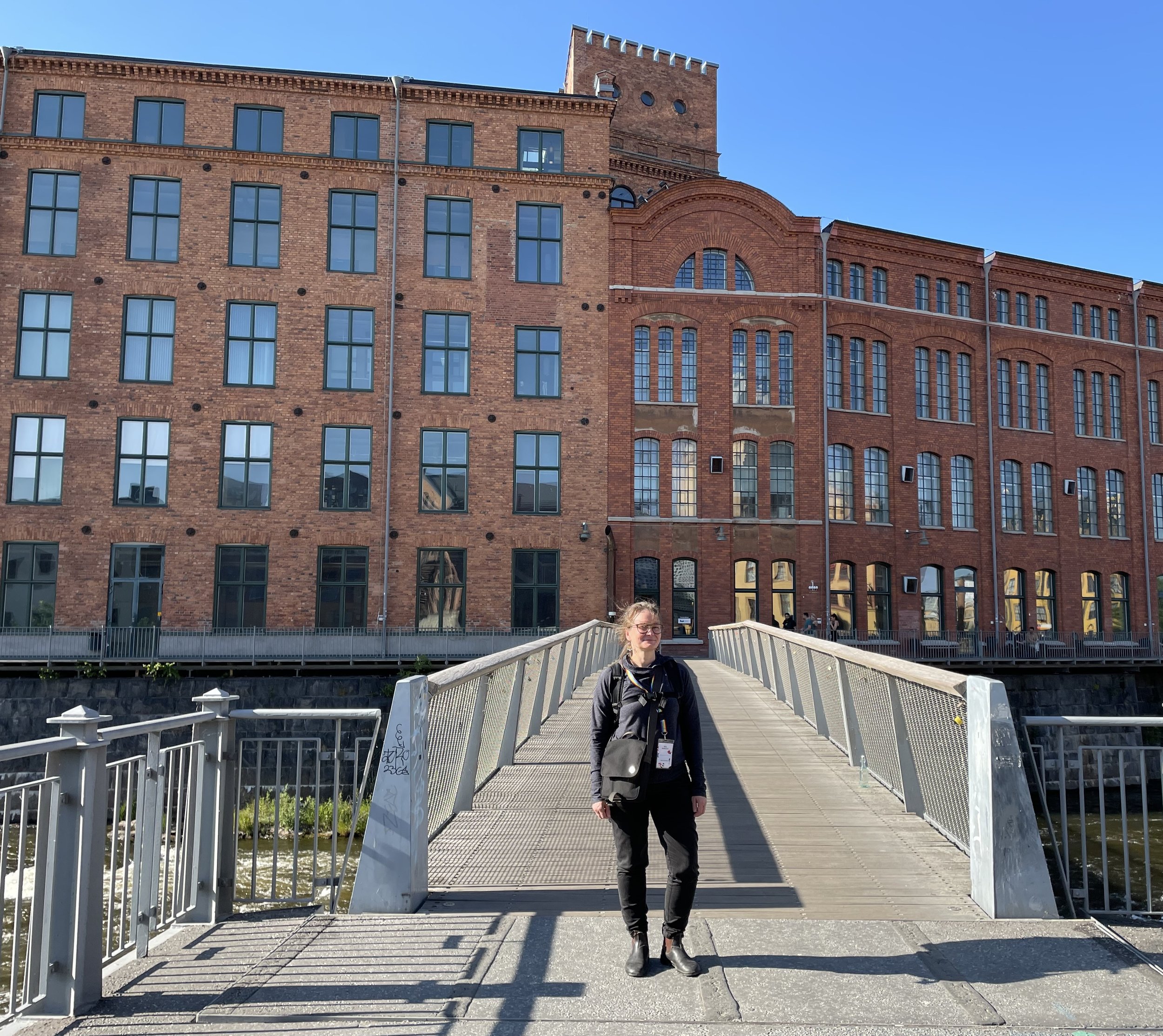 Doctoral resarcher Sara Hulkkonen by the university campus area_Photo_Maarit Mäkelä_.jpg