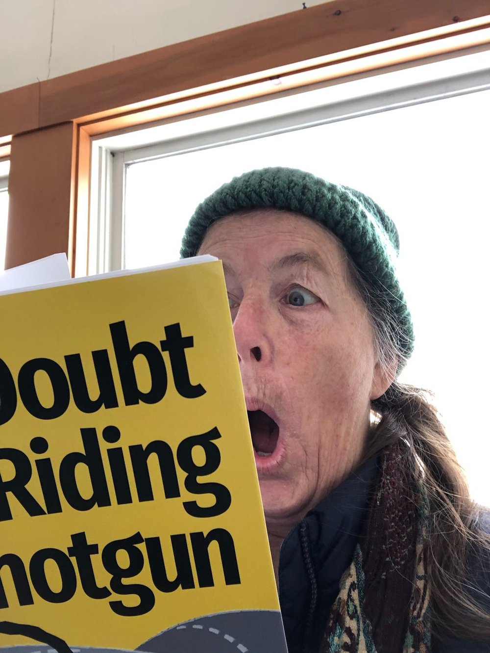 Woman_Reading_Doubt_Riding_Shotgun.jpg