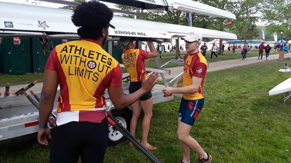  Yimer (left), Senior Assistant Coach for Athletes Without Limits, with ID athletes at a regatta in Philadelphia. 