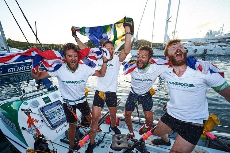  Isaac Kenyon (L), with his crew after completing the 2018 Talisker Whisky Atlantic Challenge. 