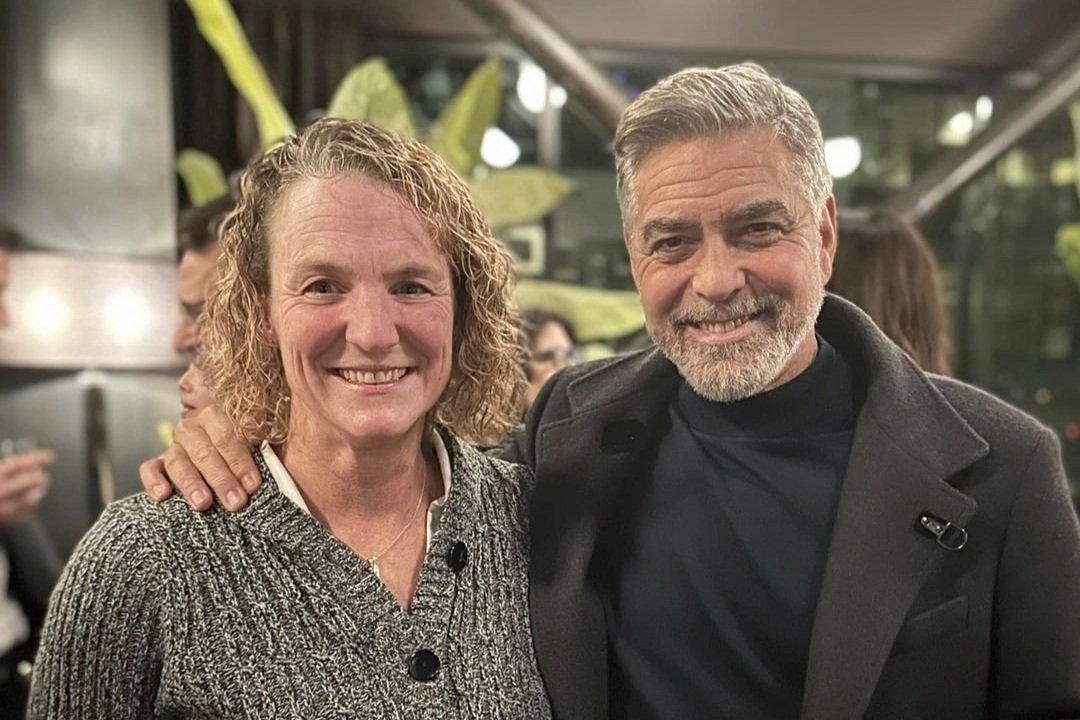  Jennifer Huffman, masters rower with College Club in Seattle, and granddaughter of Joe Rantz, attends the premier of The Boys in the Boat with director George Clooney. 