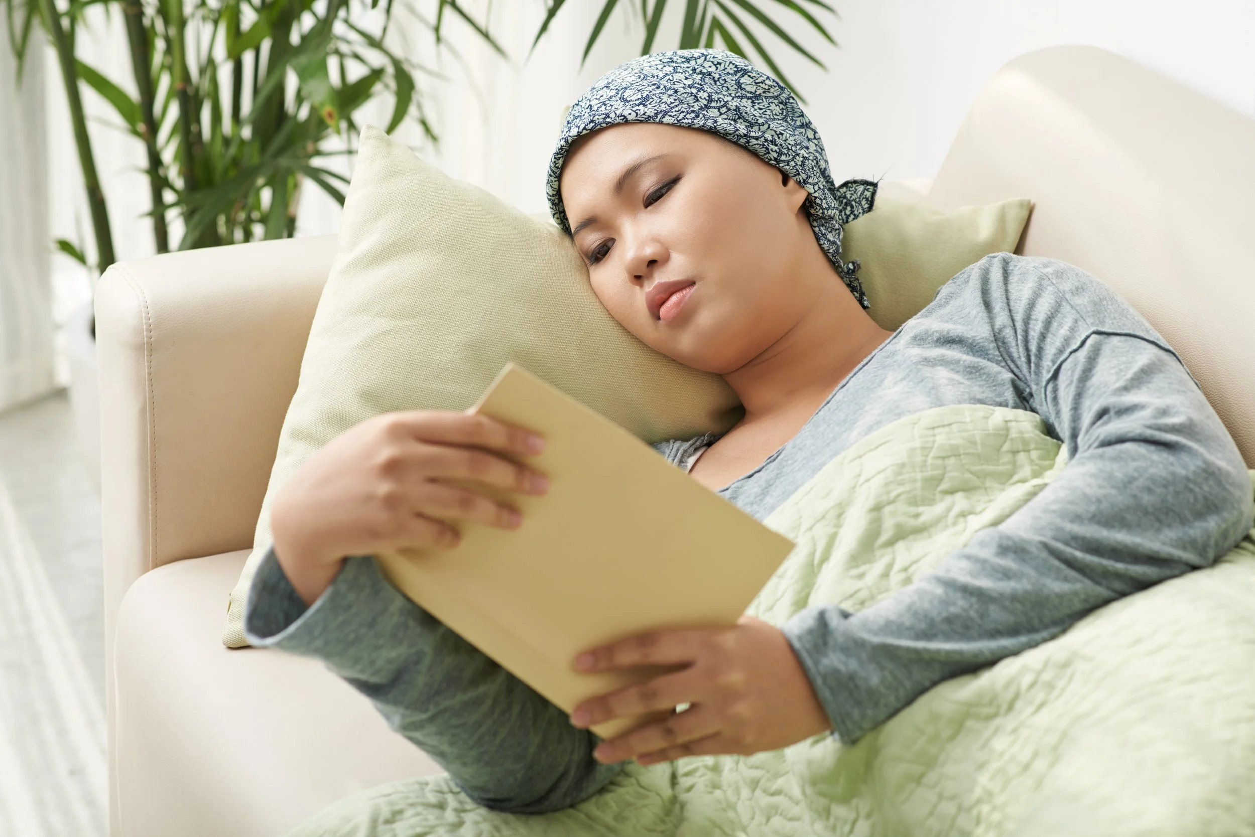 A cancer patient reading about the safety of Acupuncture during treatment