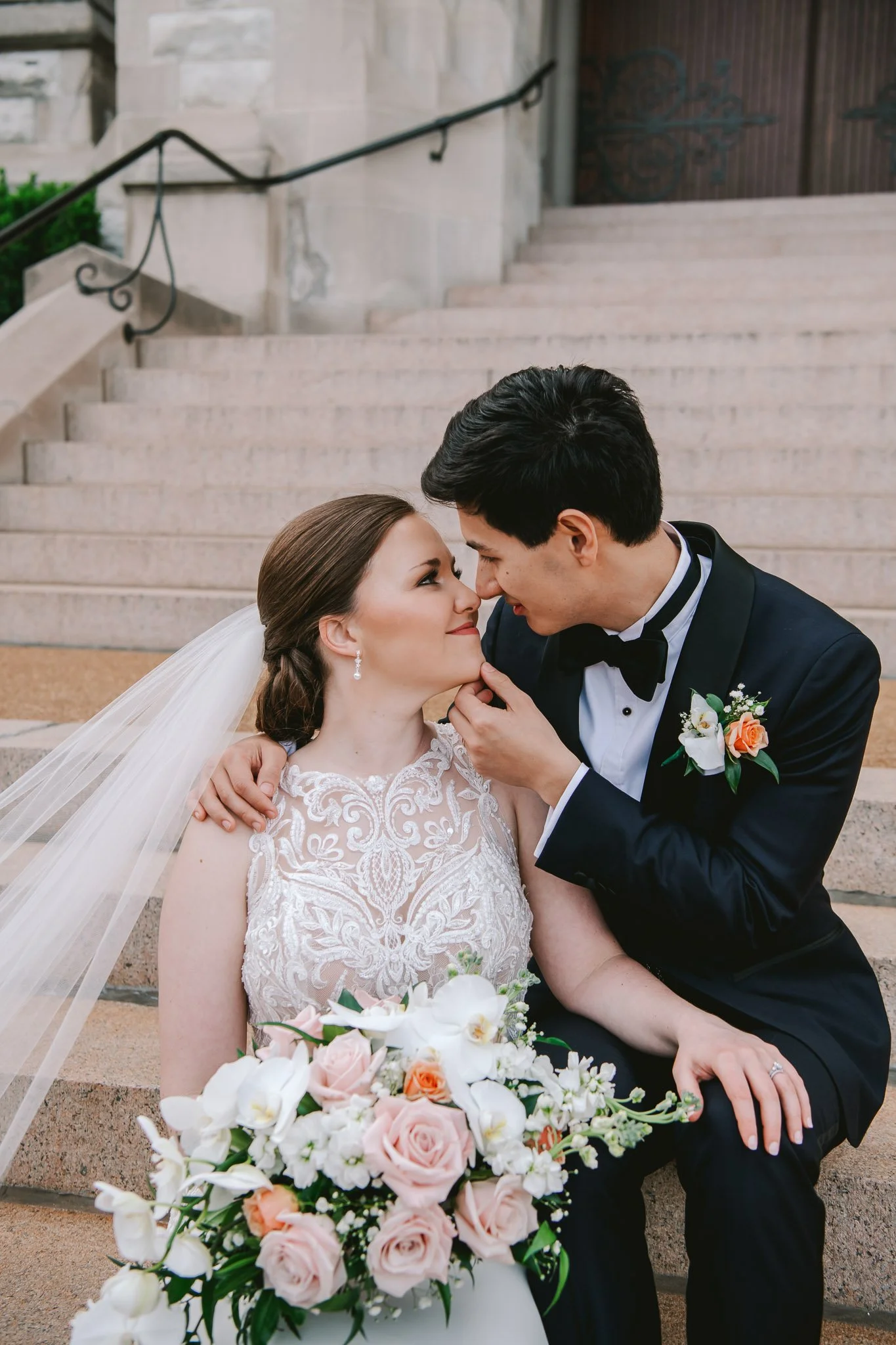 Bride and Groom editorial Portrait outside catholic ceremony at St. Xavier College Church in St. Louis, Missouri photographed by Jewels Photo Co.