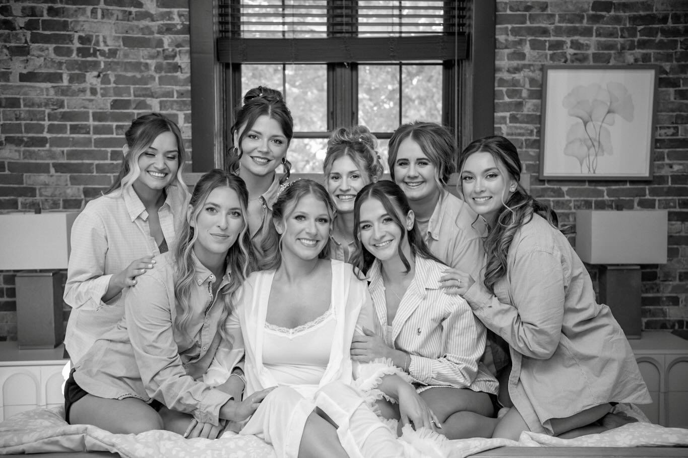 The beginning of a wedding day carries a kind of quiet magic that cannot be recreated once it passes. Photographing the bride surrounded by her closest friends and family captures the anticipation, laughter, nerves, and tender pauses before everythin