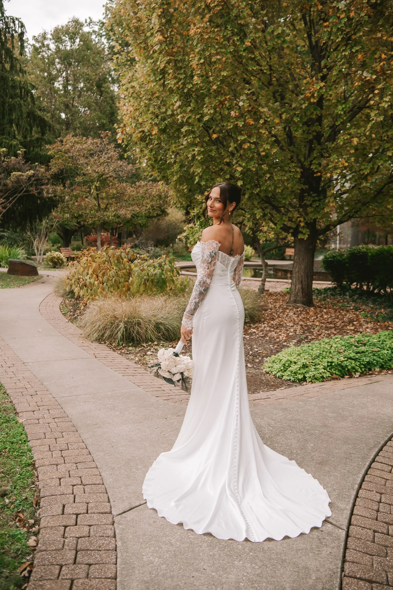 elegant bridal portrait of wedding dress and bouquet in saint louis missouri Photographed by Julia Spencer of Jewels Photo Co.