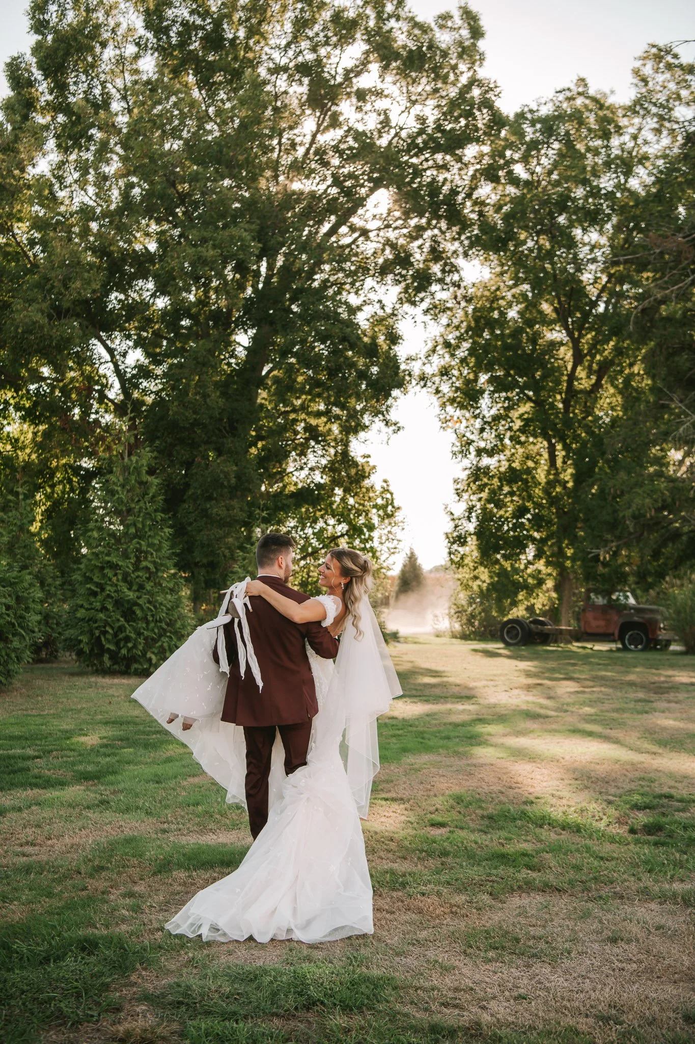 Bride and Groom after ceremony at Schwarz Barn in Illinois Photographed by Julia Spencer of Jewels Photo Co.