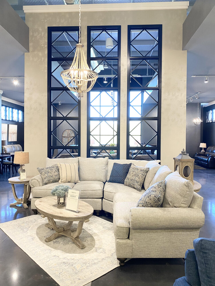 Architectural touches add drama to a Bassett sectional.